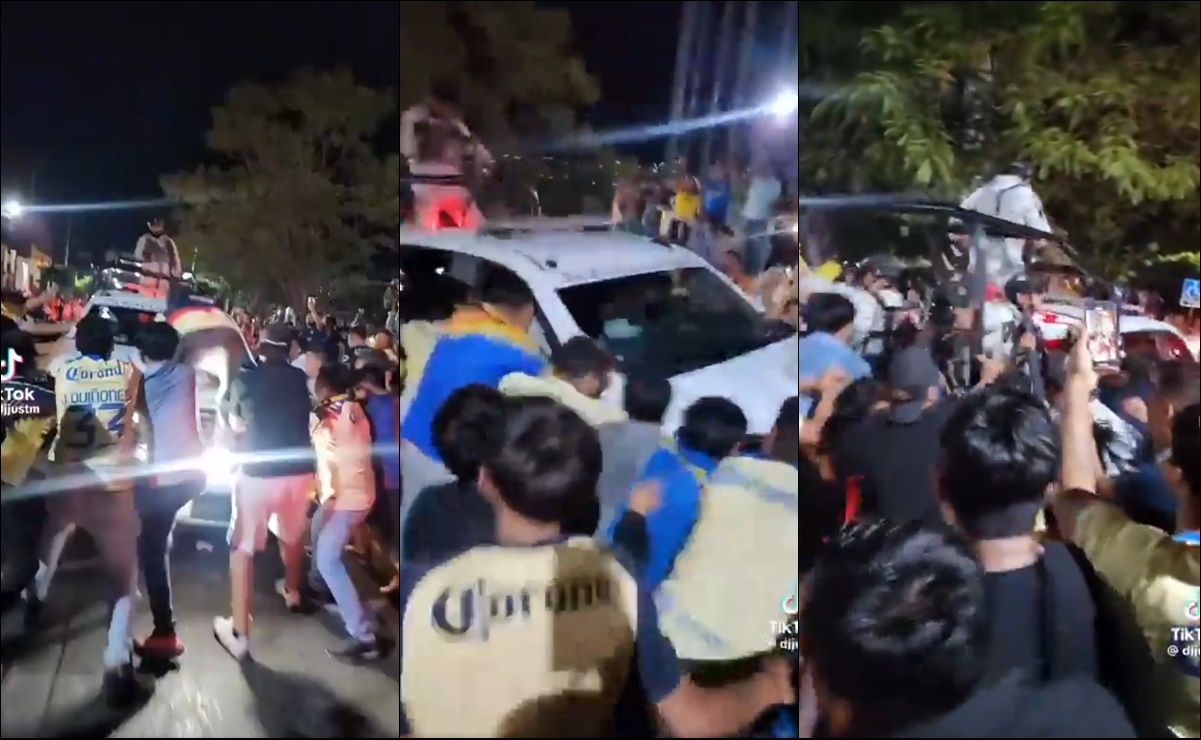 Aficionados del América sacuden camioneta de la policía durante los festejos por el Bicampeonato