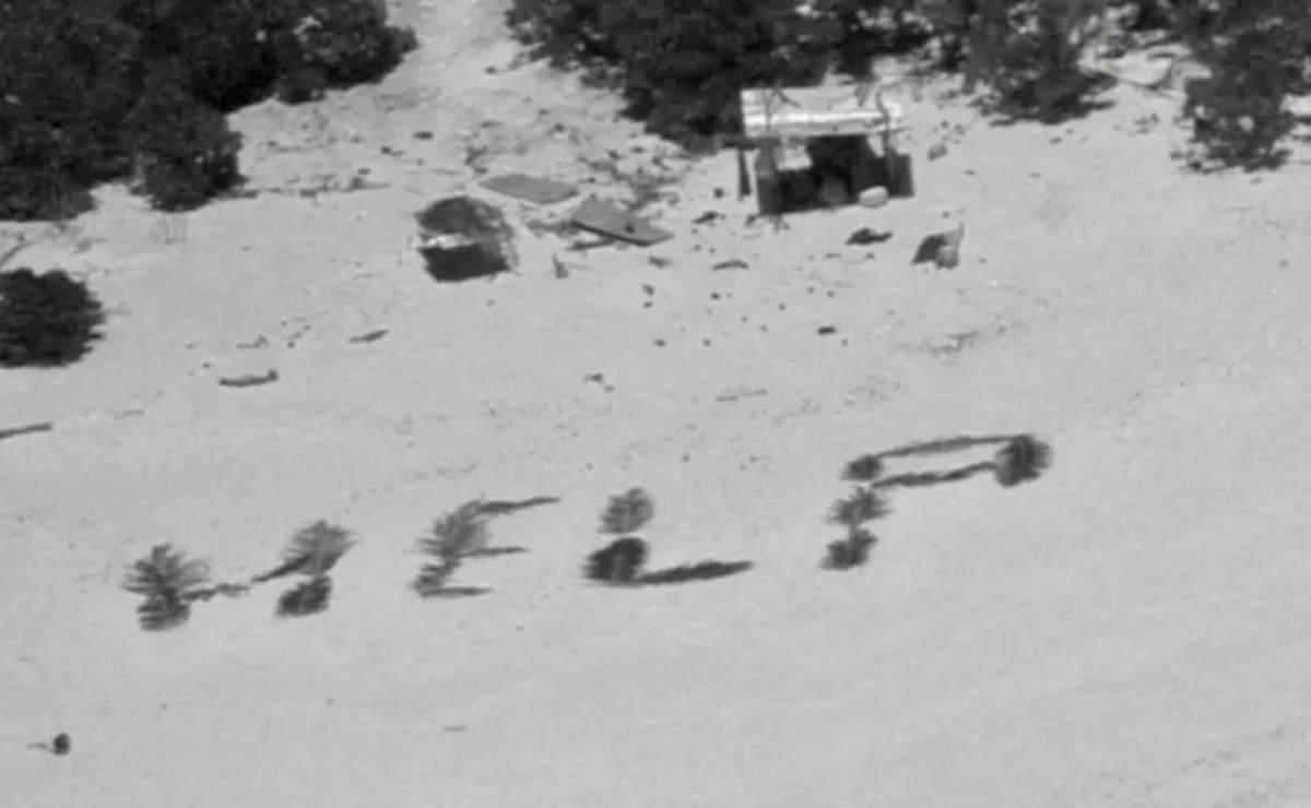 Los 3 náufragos rescatados en una isla desierta tras escribir HELP en la arena de una playa