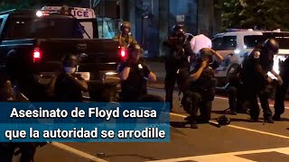 Policías de EU se arrodilla por el asesinato de George Floyd