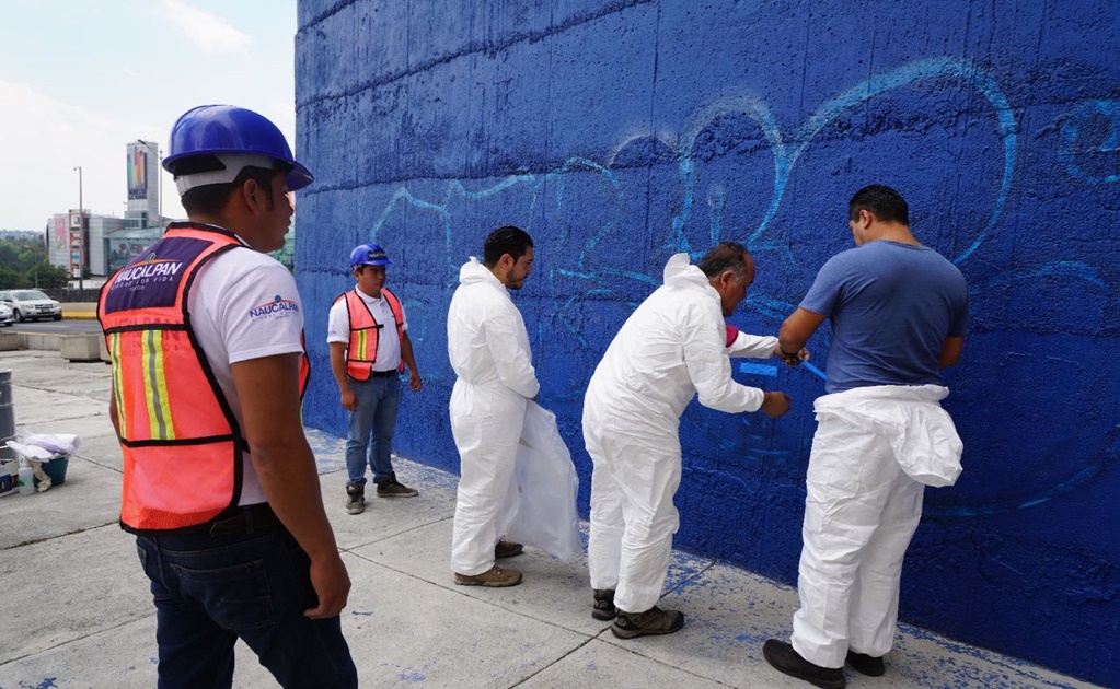 Retiran grafitis de Torres de Satélite