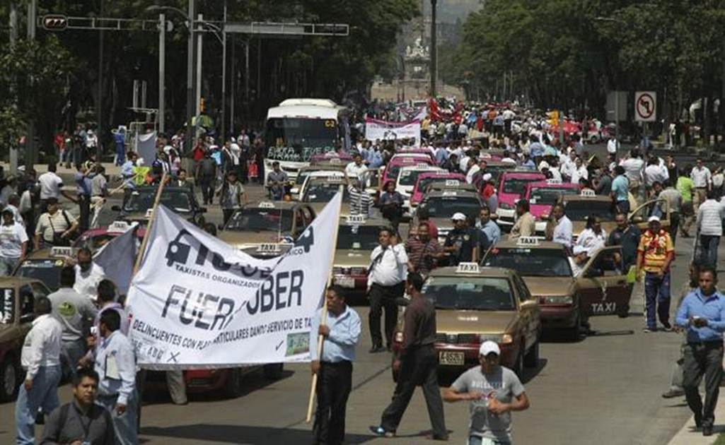 Taxistas prometen no "cazar" a Uber