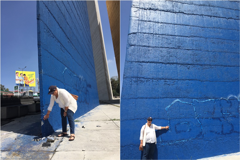 Chocan y grafitean Torre Azul de Satélite