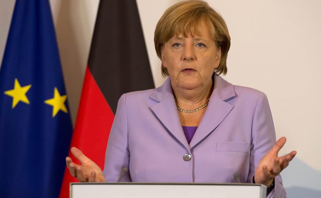 Merkel pide cuotas obligatorias para acoger refugiados en UE