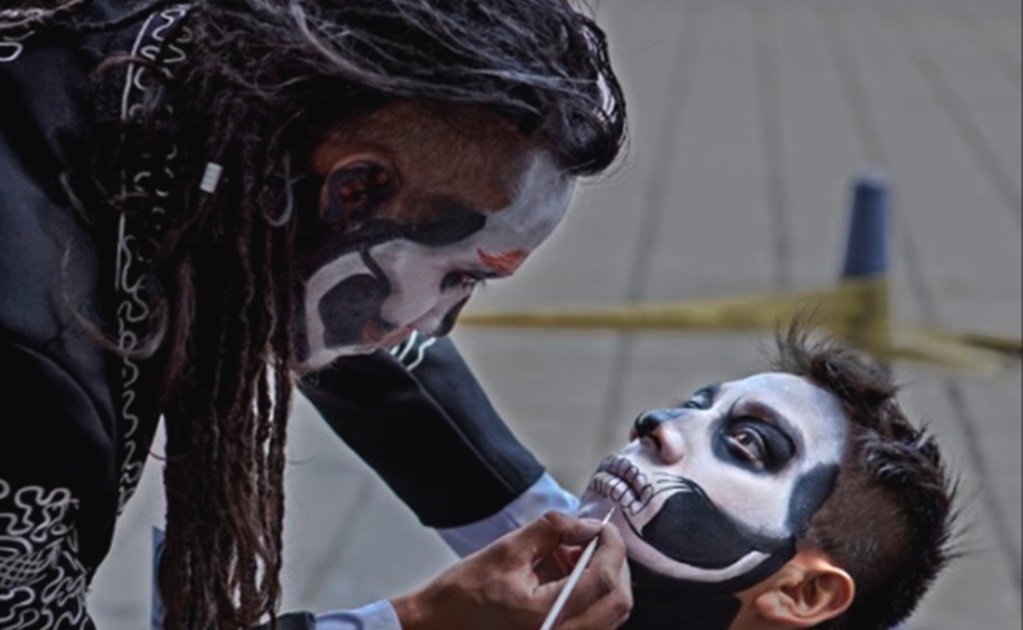 Mexico City celebrates Day of the Dead with body art