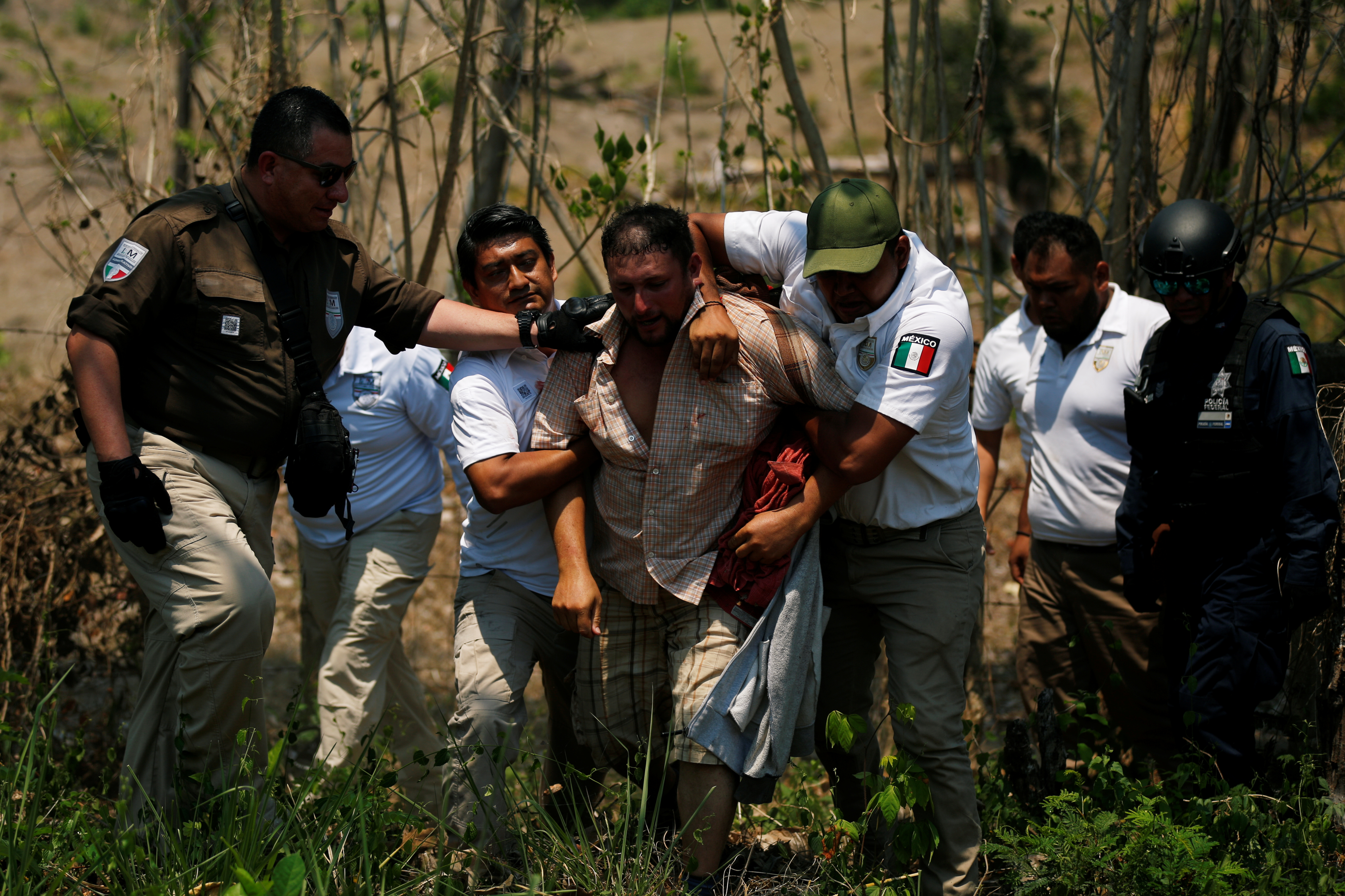 Reportan detenciones en caravana migrante en Pijijiapan, Chiapas