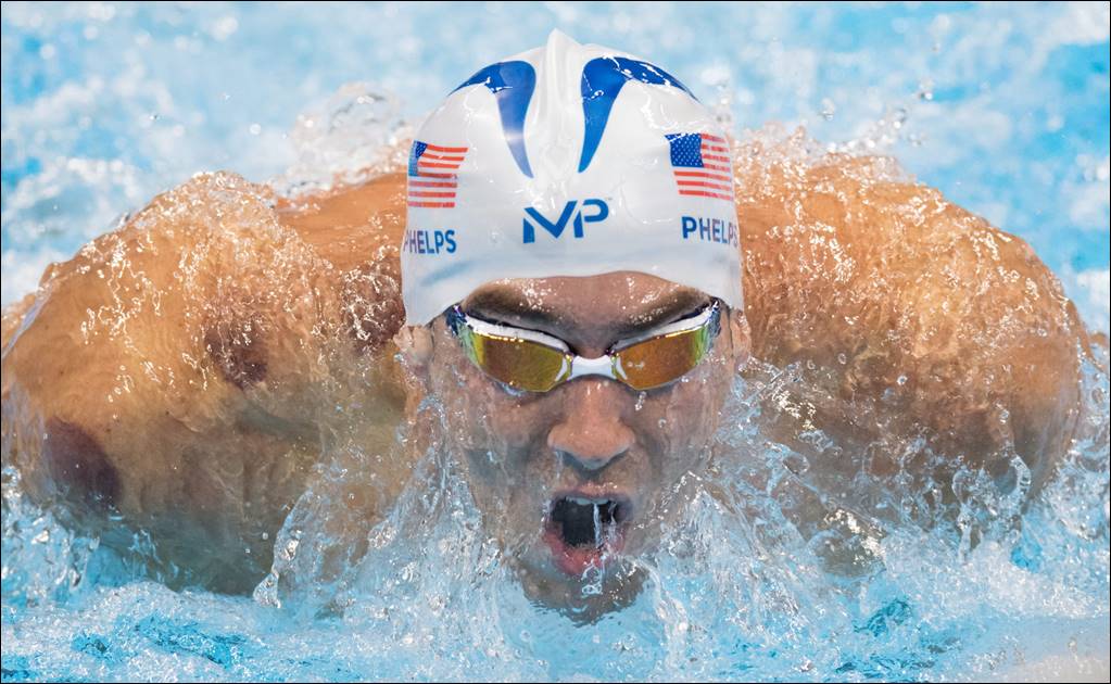Phelps avanza a semis de 200 mariposa en su primera prueba individual 