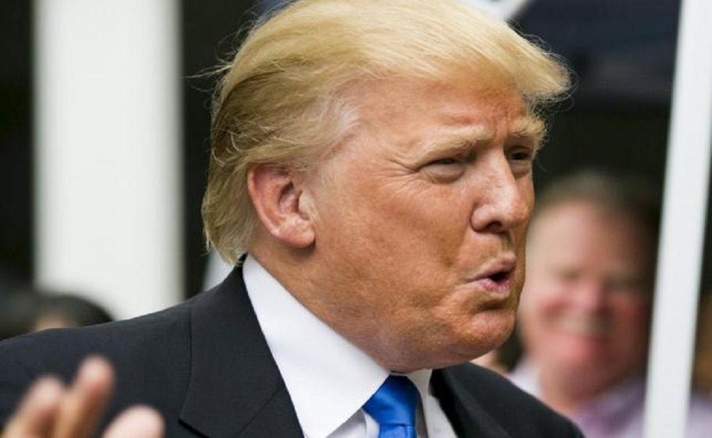 Trump says he has been 'a little bit divisive' in Republican race