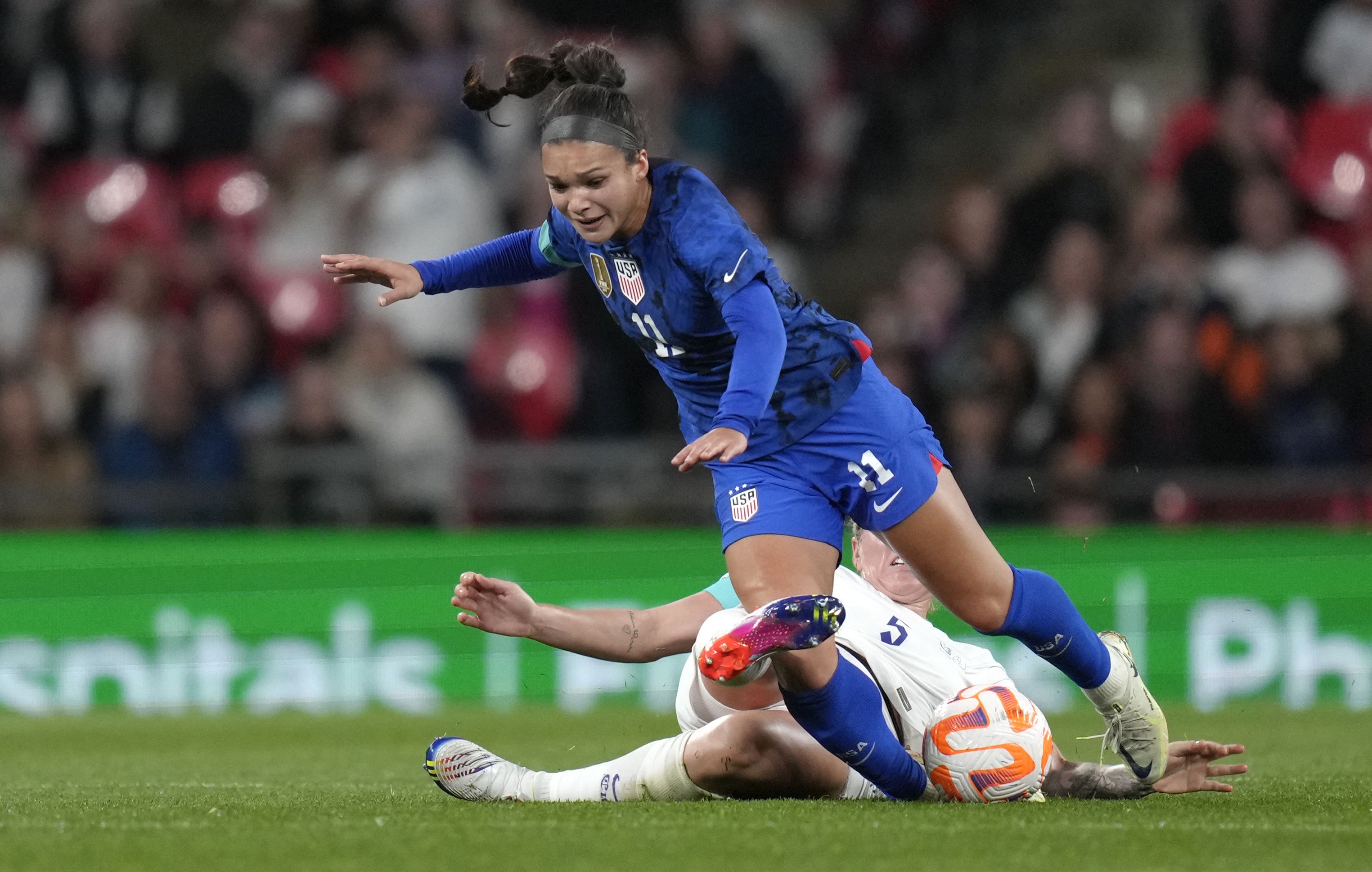 England, U.S. women's soccer teams show solidarity with victims of