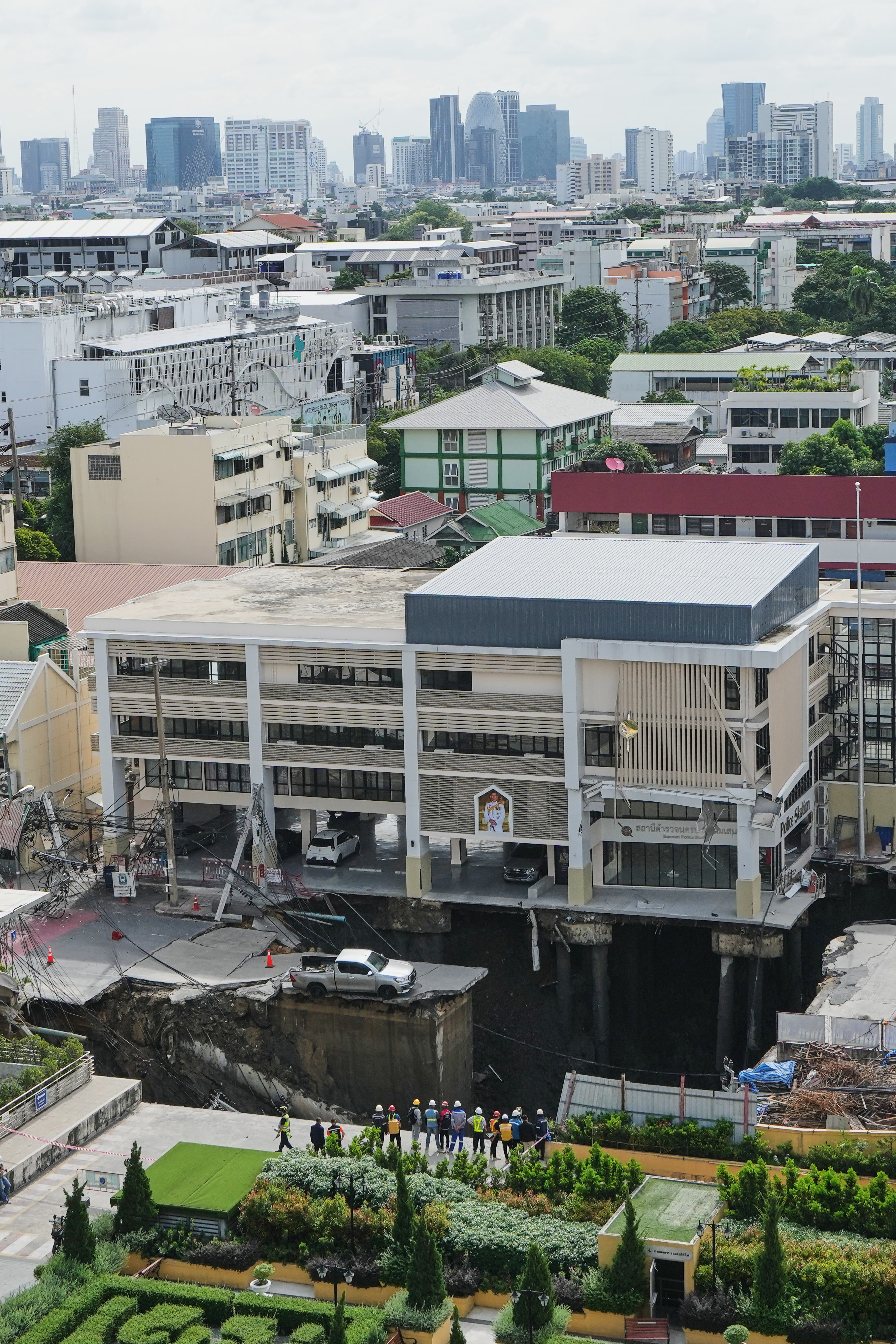 A Bangkok road collapse creates a sinkhole disrupting traffic and