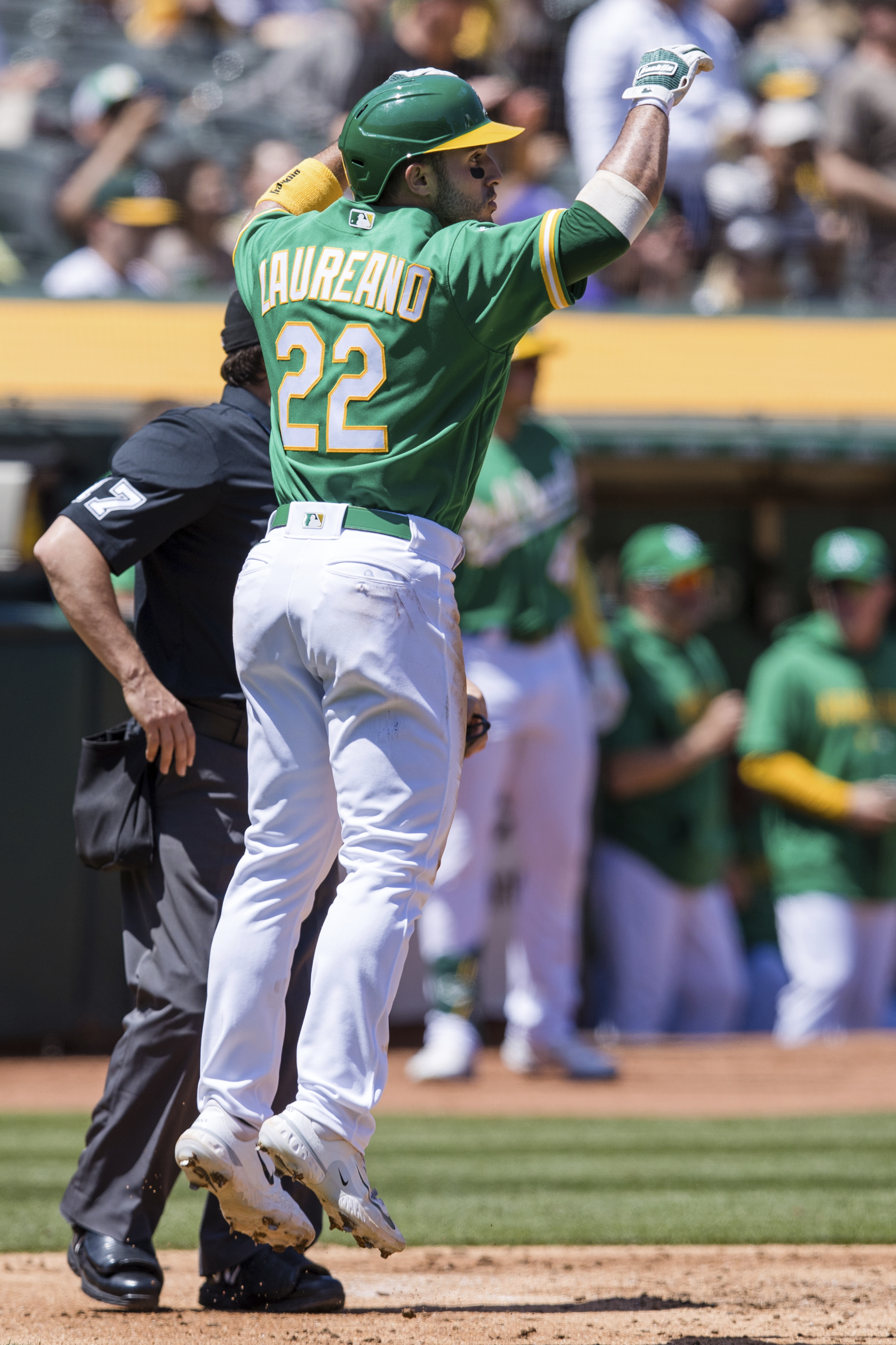 Oakland Athletics' Ramon Laureano, left, is tagged out by Houston