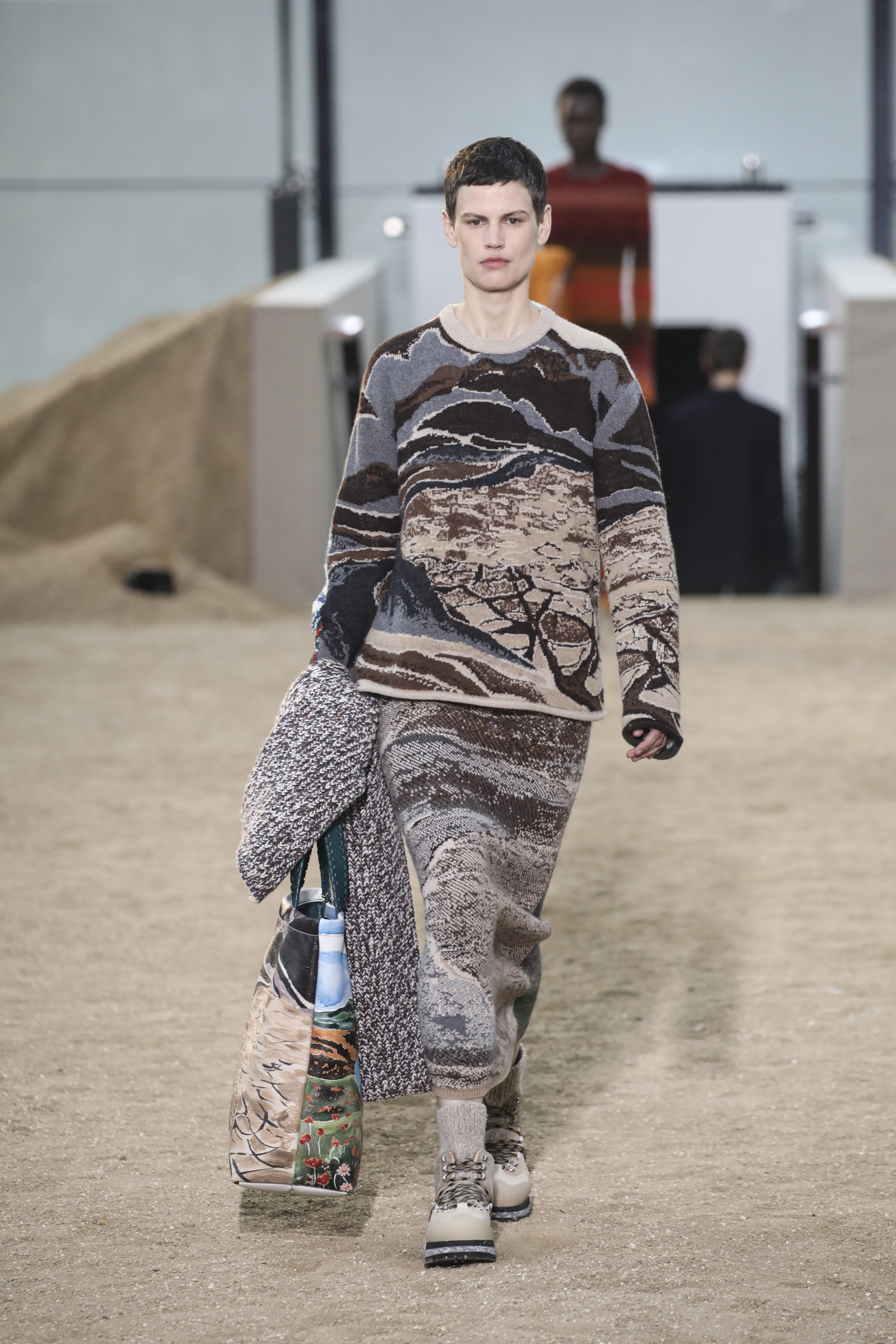 A model wears a creation as part of the Louis Vuitton Ready To Wear  Fall/Winter 2022-2023 fashion collection, unveiled during the Fashion Week  in Paris, Monday, March 7, 2022. (Photo by Vianney