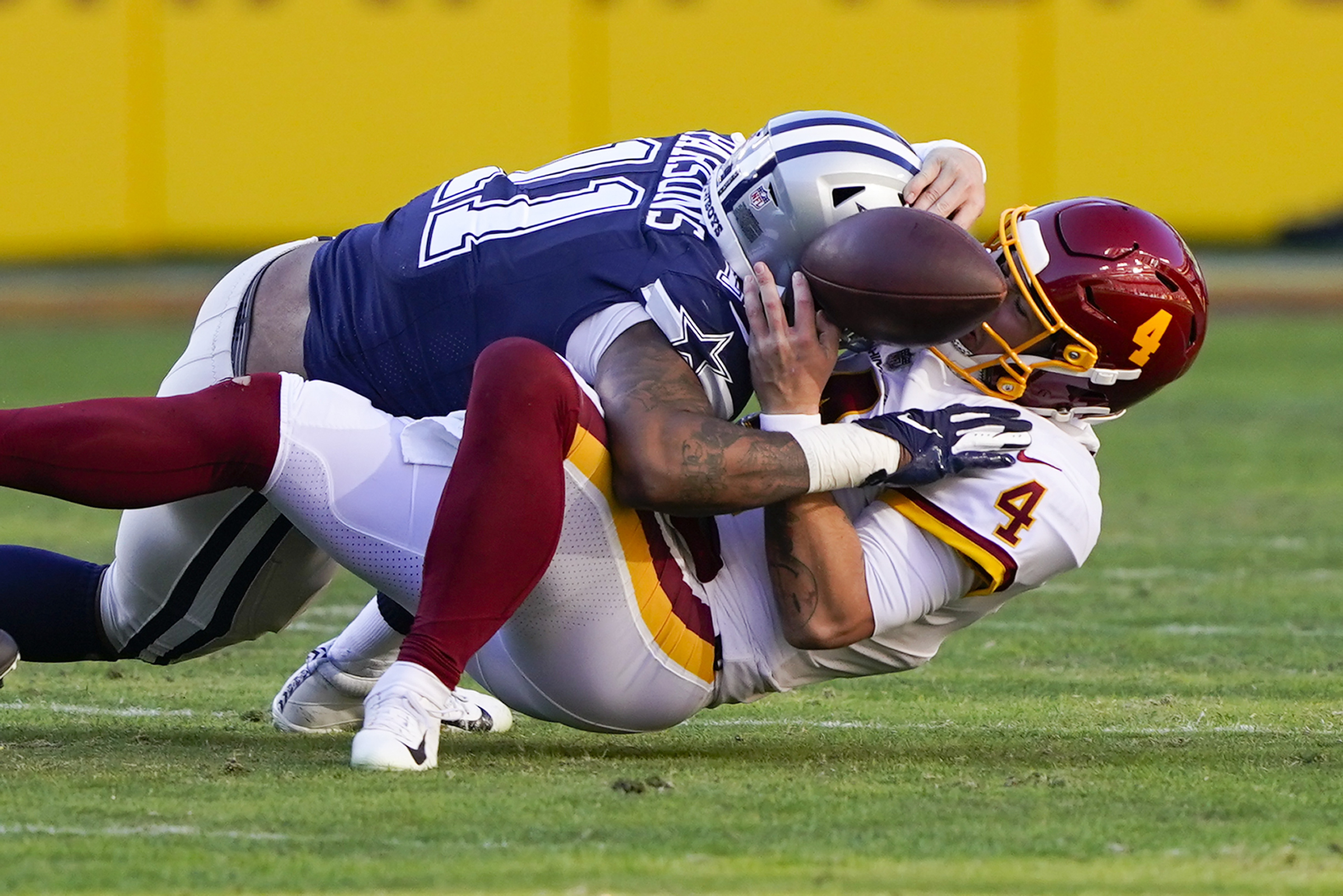 Slumping Prescott, Cowboys can thank D for NFC East cushion