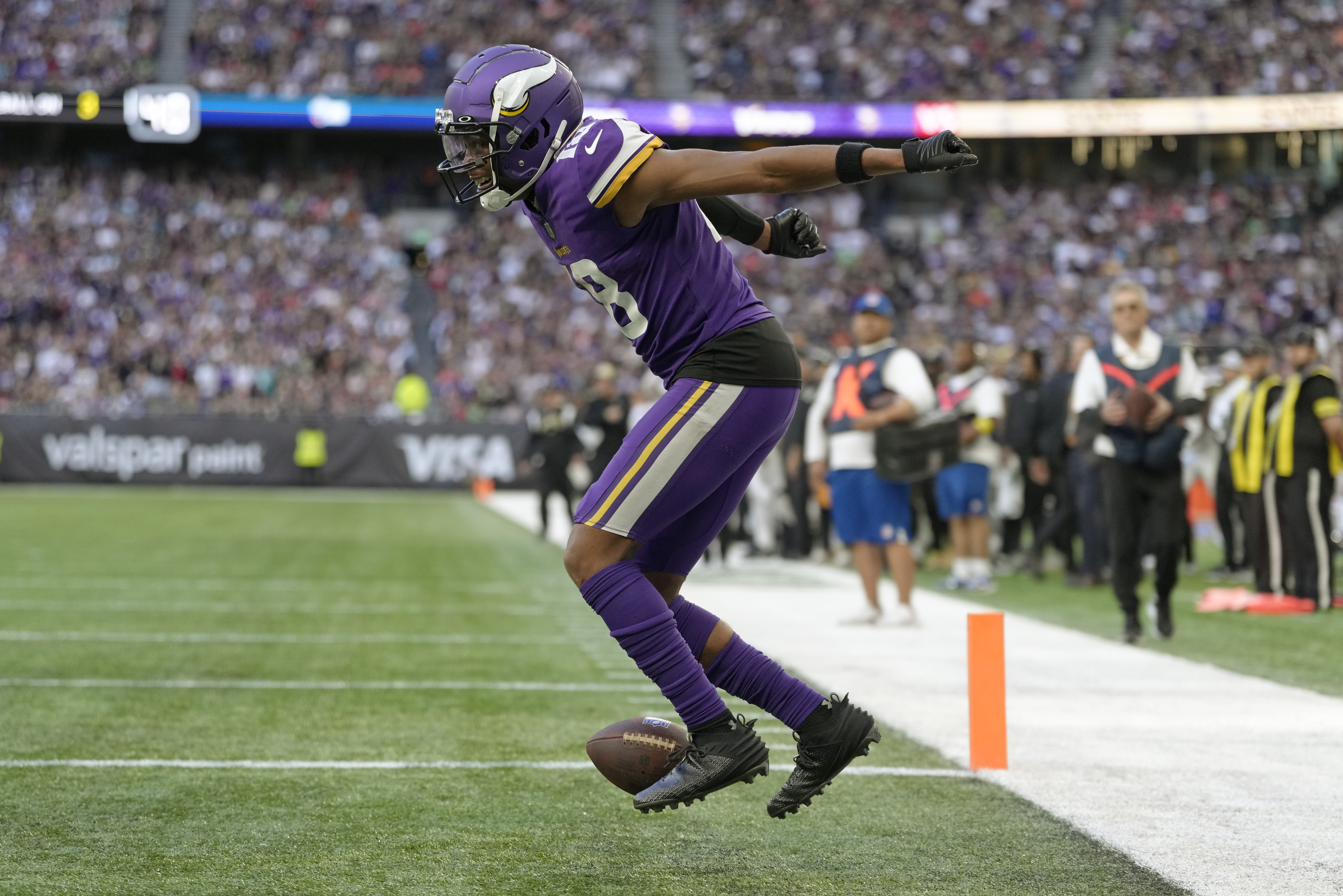 Minnesota Vikings quarterback Kirk Cousins (8), centre, is sacked during an  NFL match between Minnesota Vikings and New Orleans Saints at the Tottenham  Hotspur stadium in London, Sunday, Oct. 2, 2022. (AP