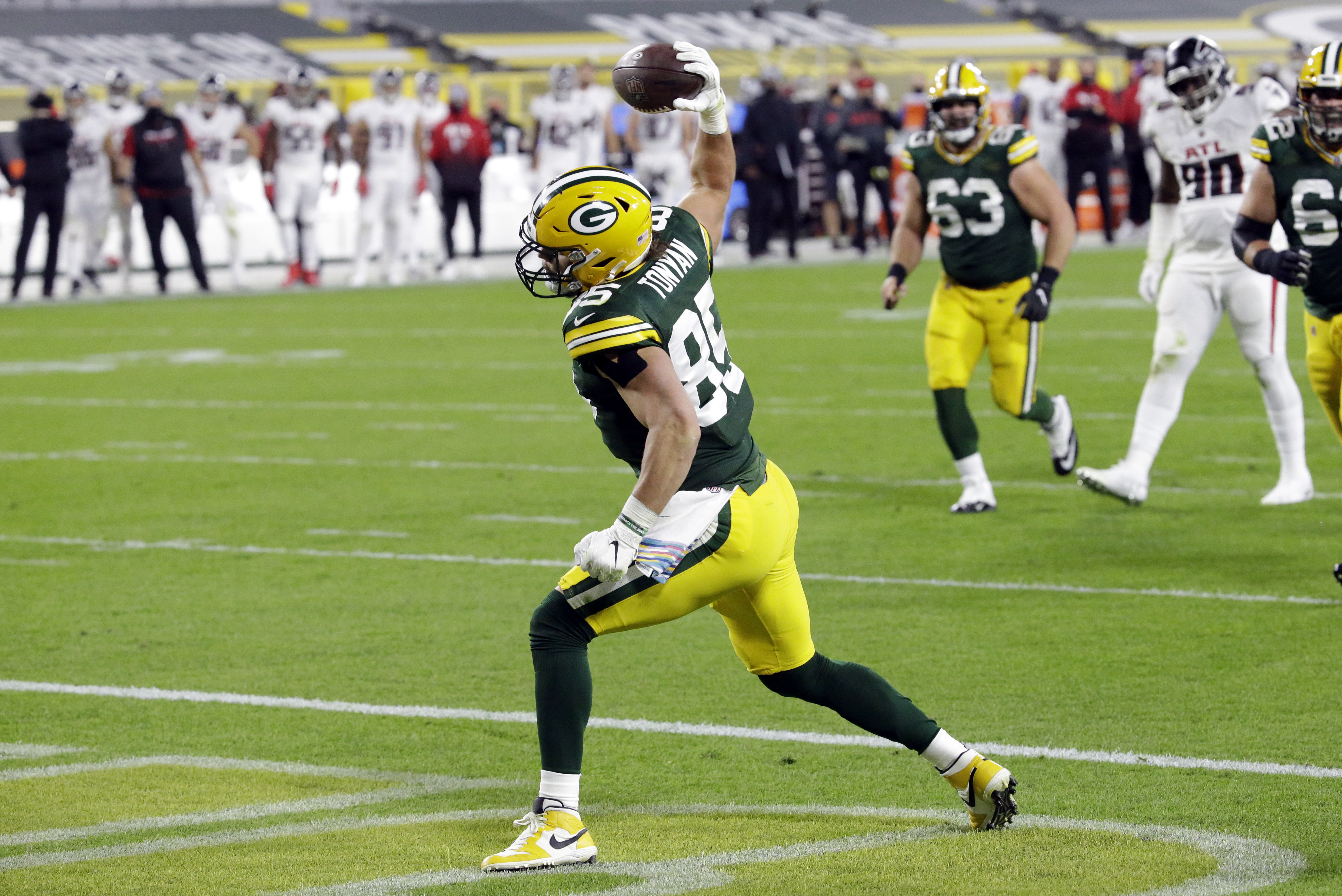 Rodgers, Tonyan lead Packers to 30-16 victory over Falcons