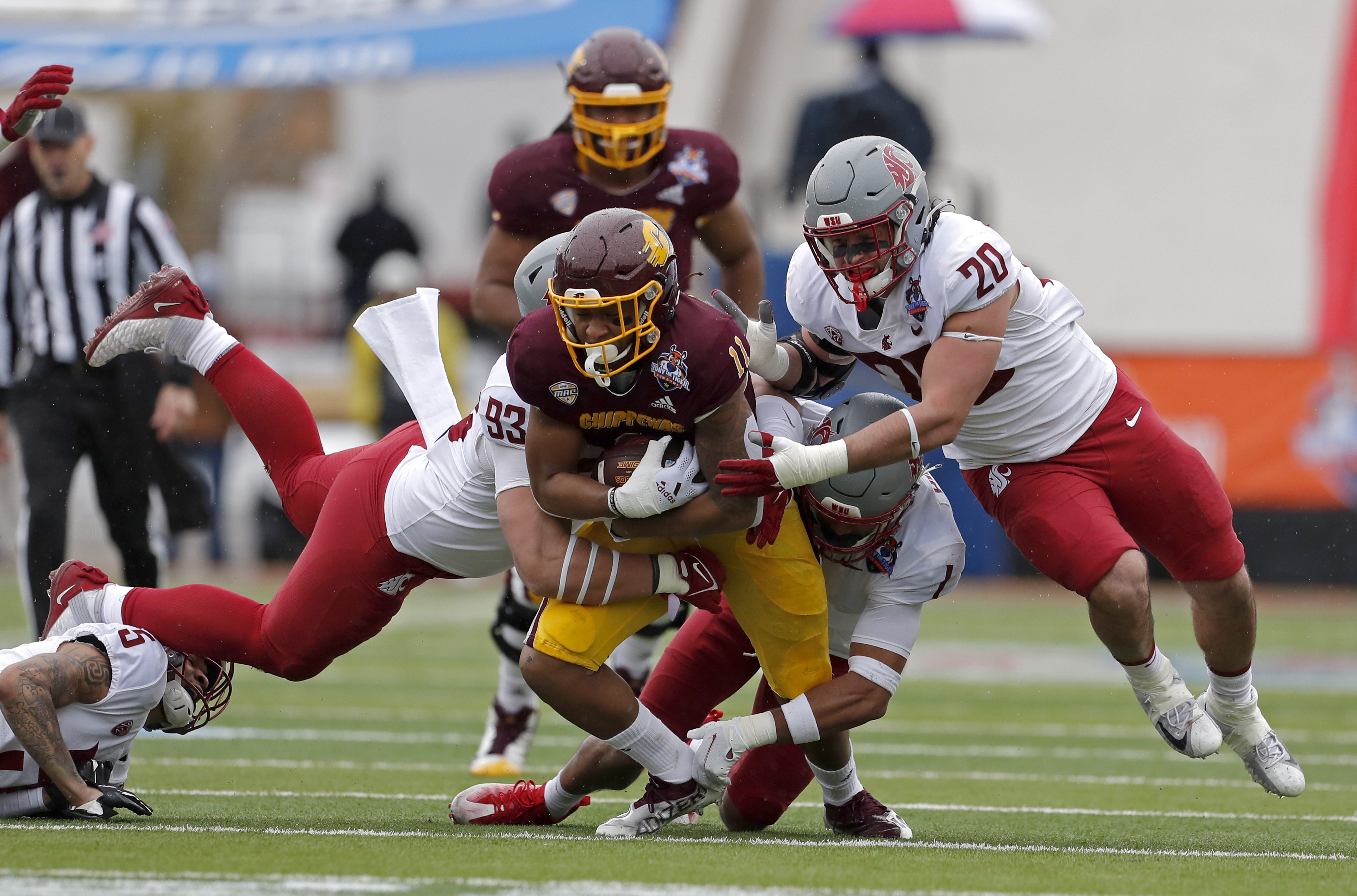 Washington State beats Miami 20-14 in snowy Sun Bowl