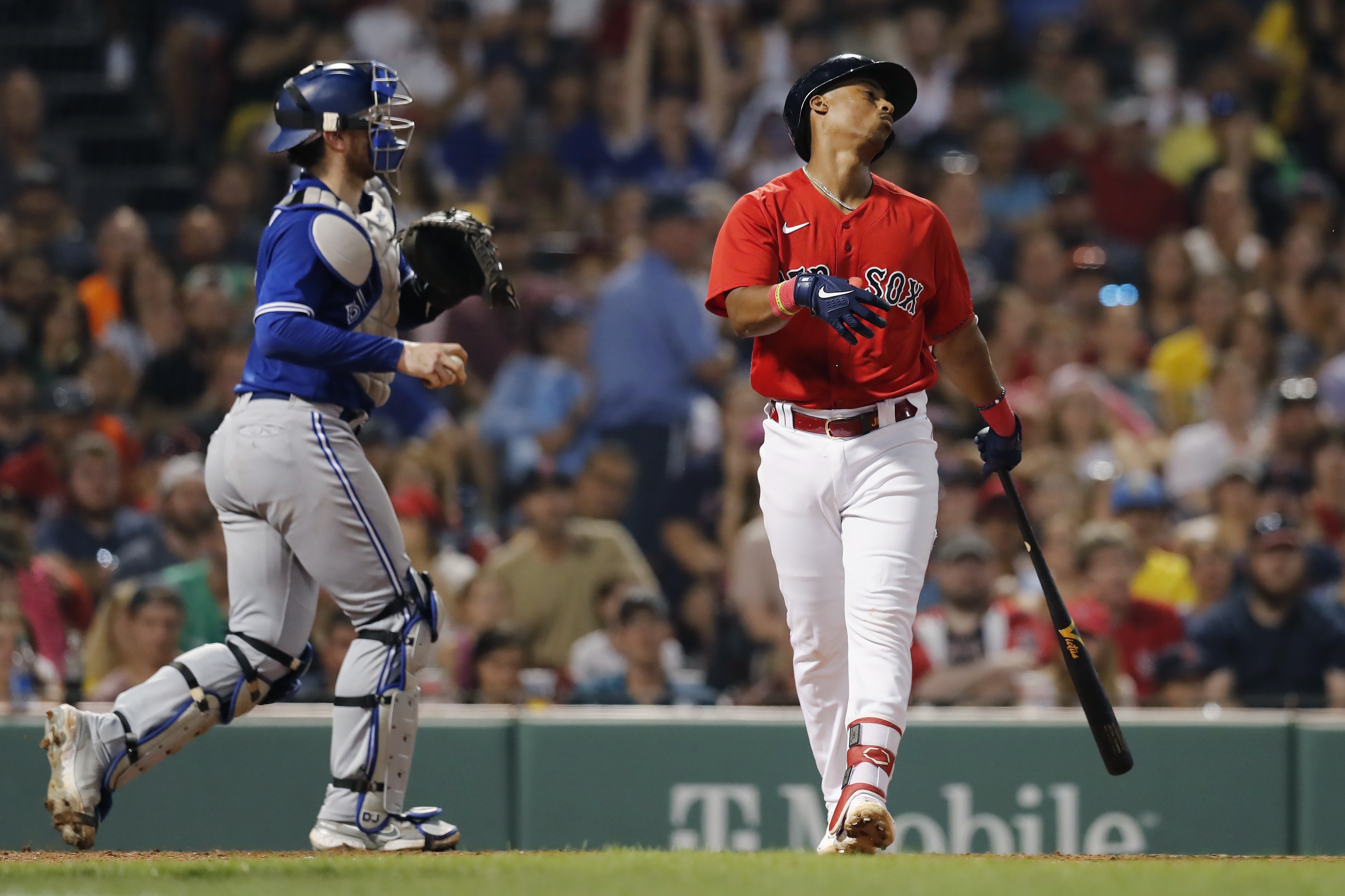 ATLANTA, GA – MAY 10: Boston relief pitcher Kenley Jansen (74) is  congratulated by teammate Raimel Tapia (17) following the conclusion of the  MLB game between the Boston Red Sox and the