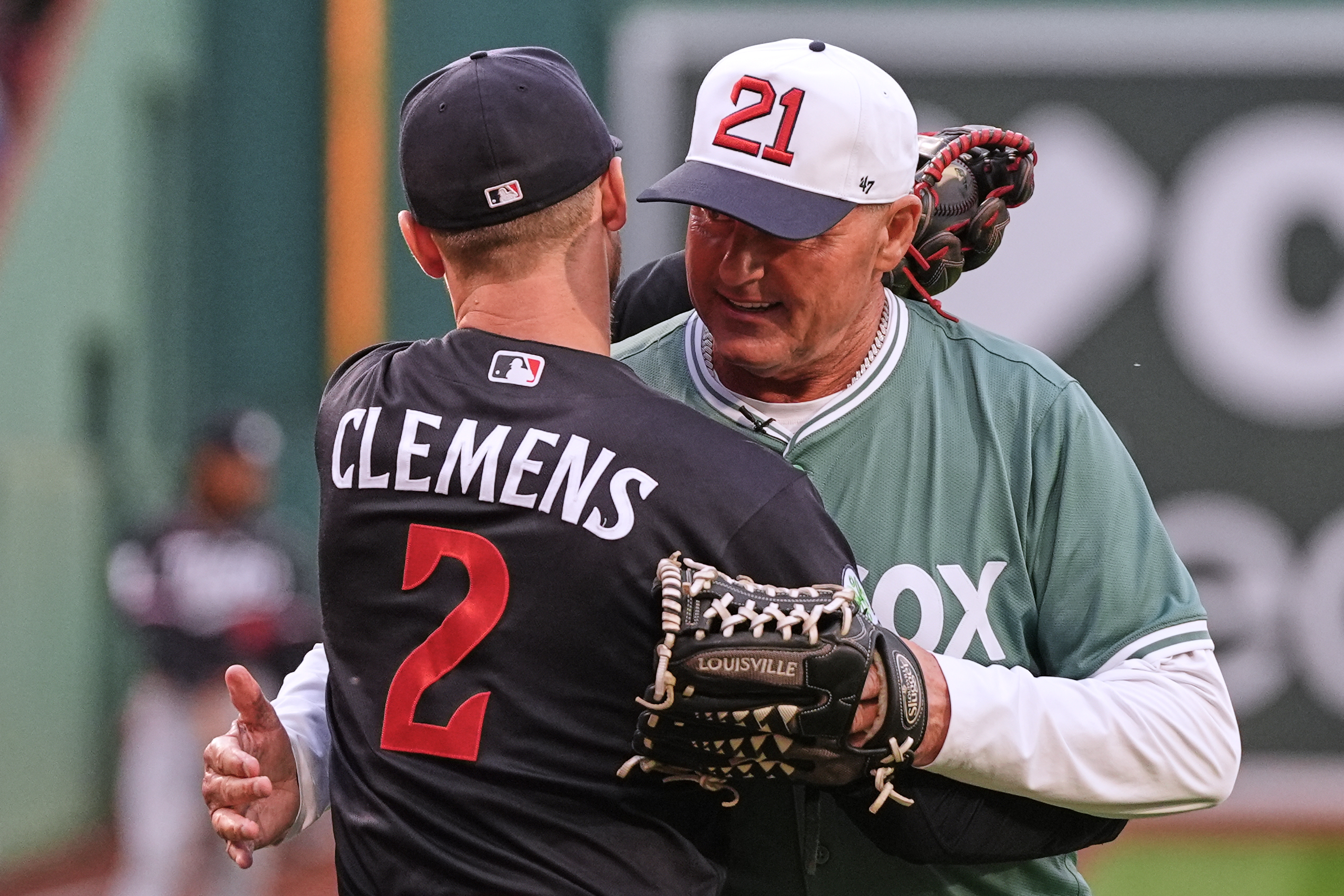 Rocket returns: Roger Clemens throws out 1st pitch to son Kody at