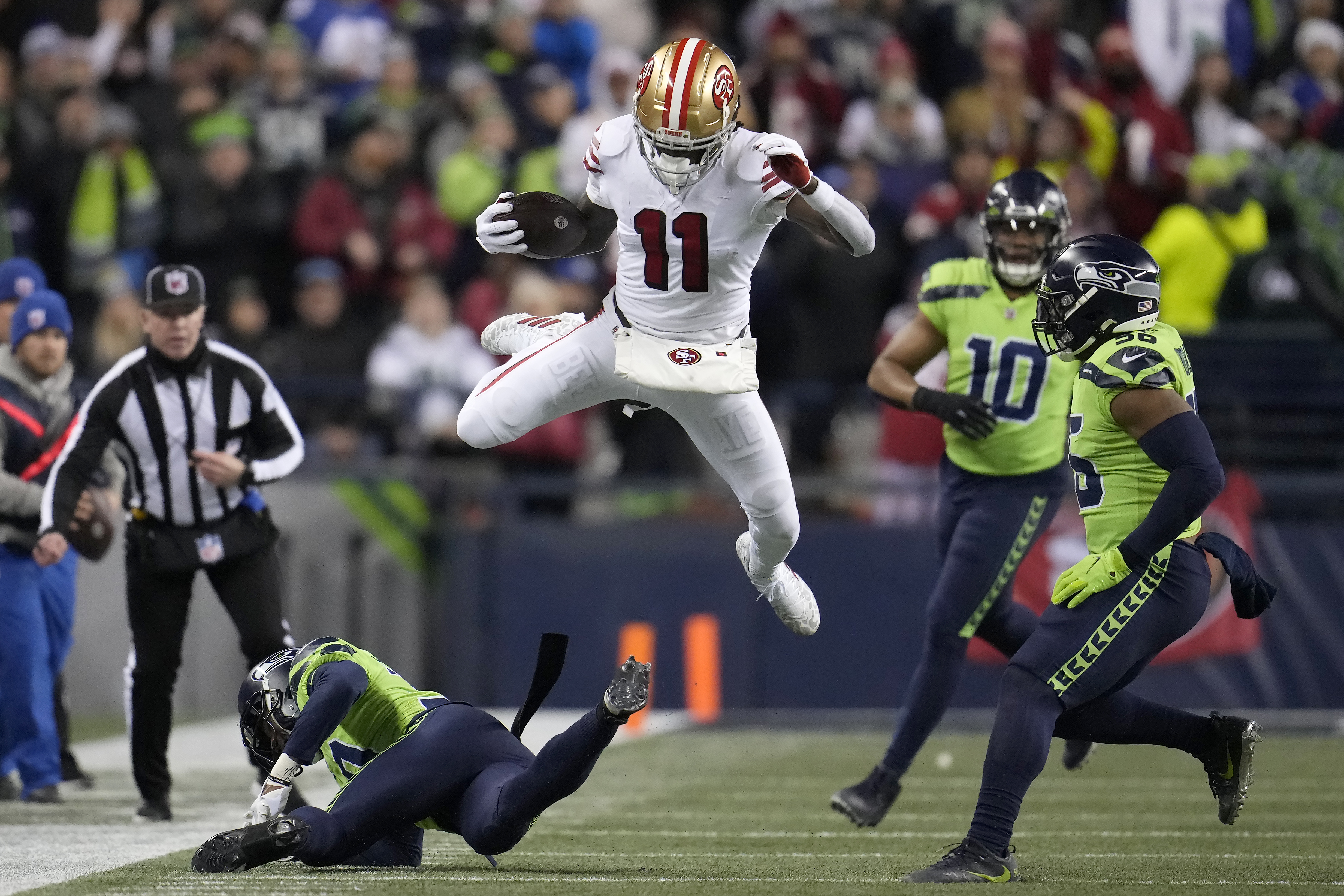 Brock Purdy, 49ers topple Seahawks to win NFC West