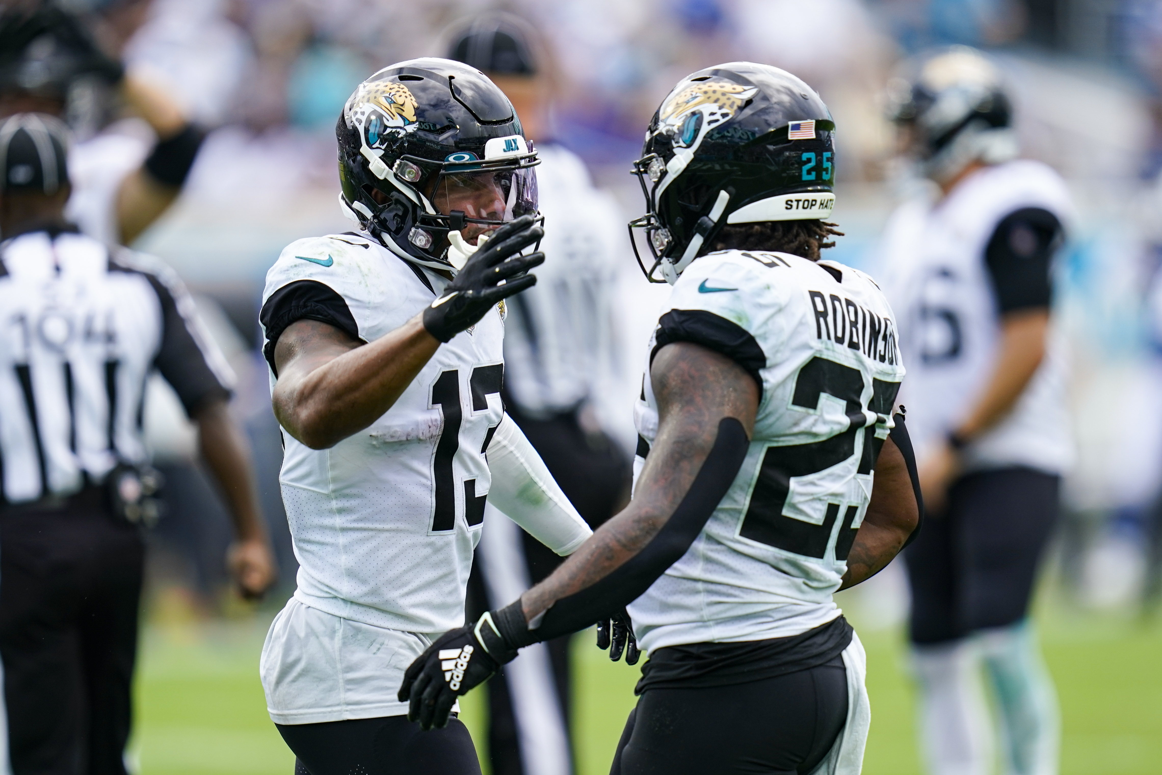 Jacksonville Jaguars running back James Robinson (25) runs the ball for a  touchdown during the first half of an NFL football game against the  Indianapolis Colts, Sunday, Sept. 18, 2022, in Jacksonville