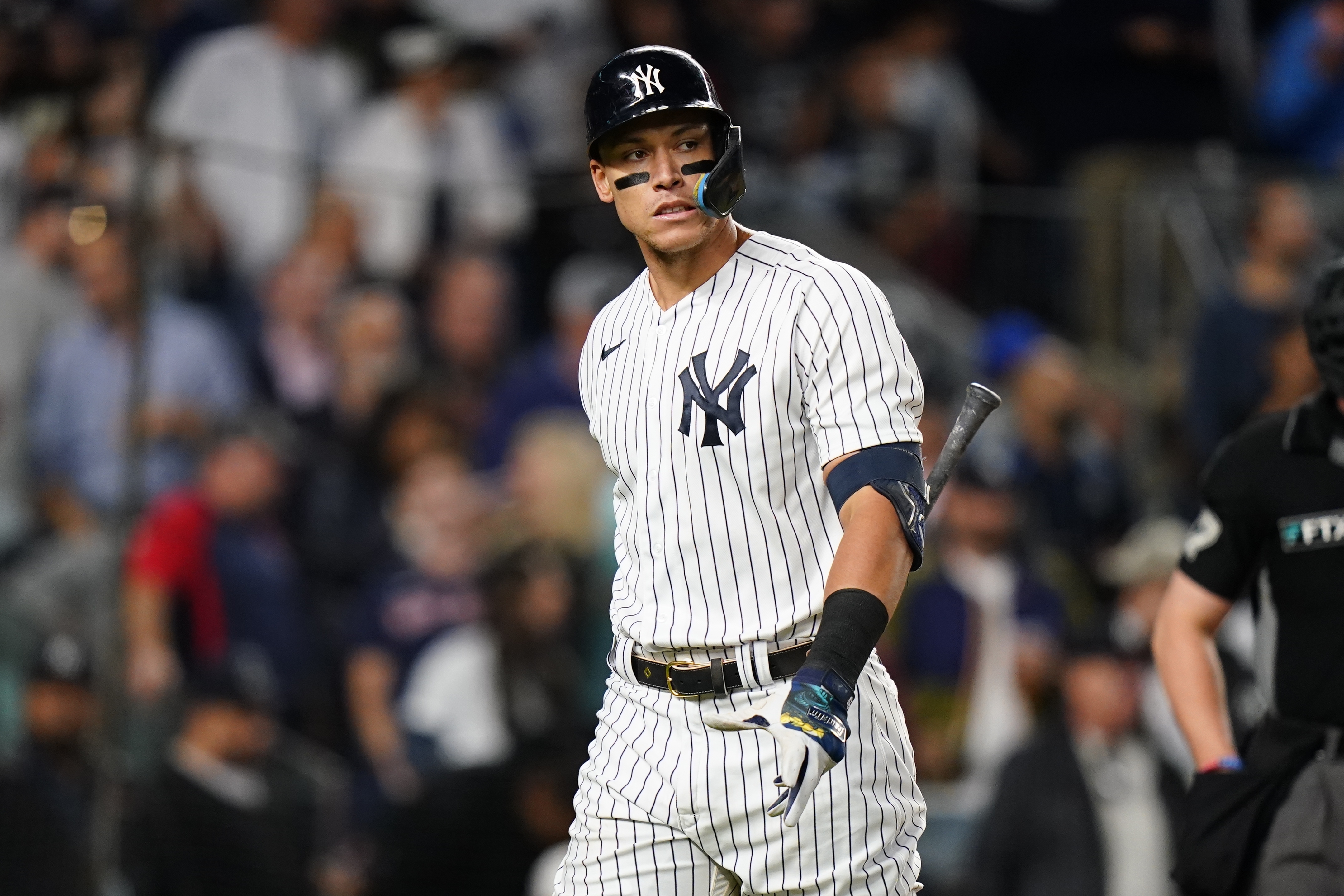 Marwin Gonzalez of the New York Yankees reacts after reaching