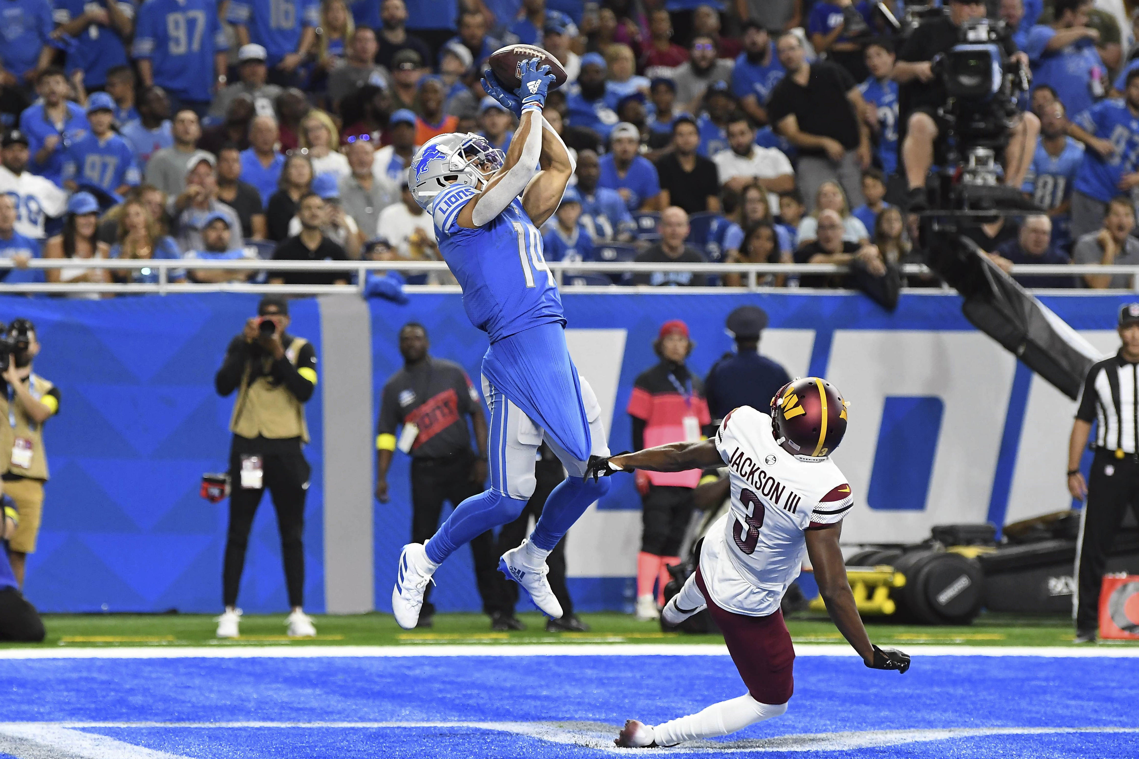 Detroit Lions punter Jack Fox (3) punts against the Washington