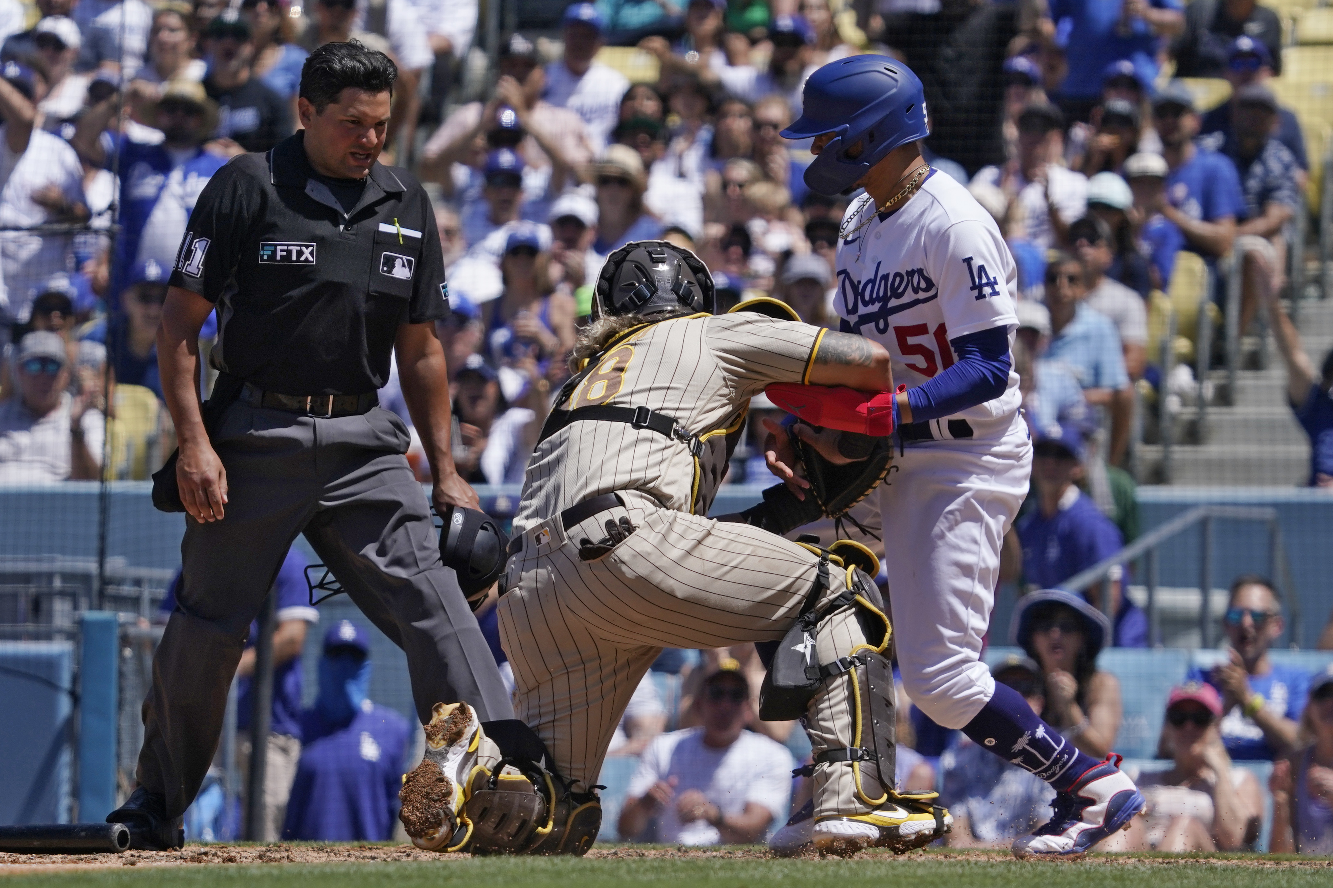 Padres rally for 4 in 9th, beat Dodgers 4-2 to avoid sweep