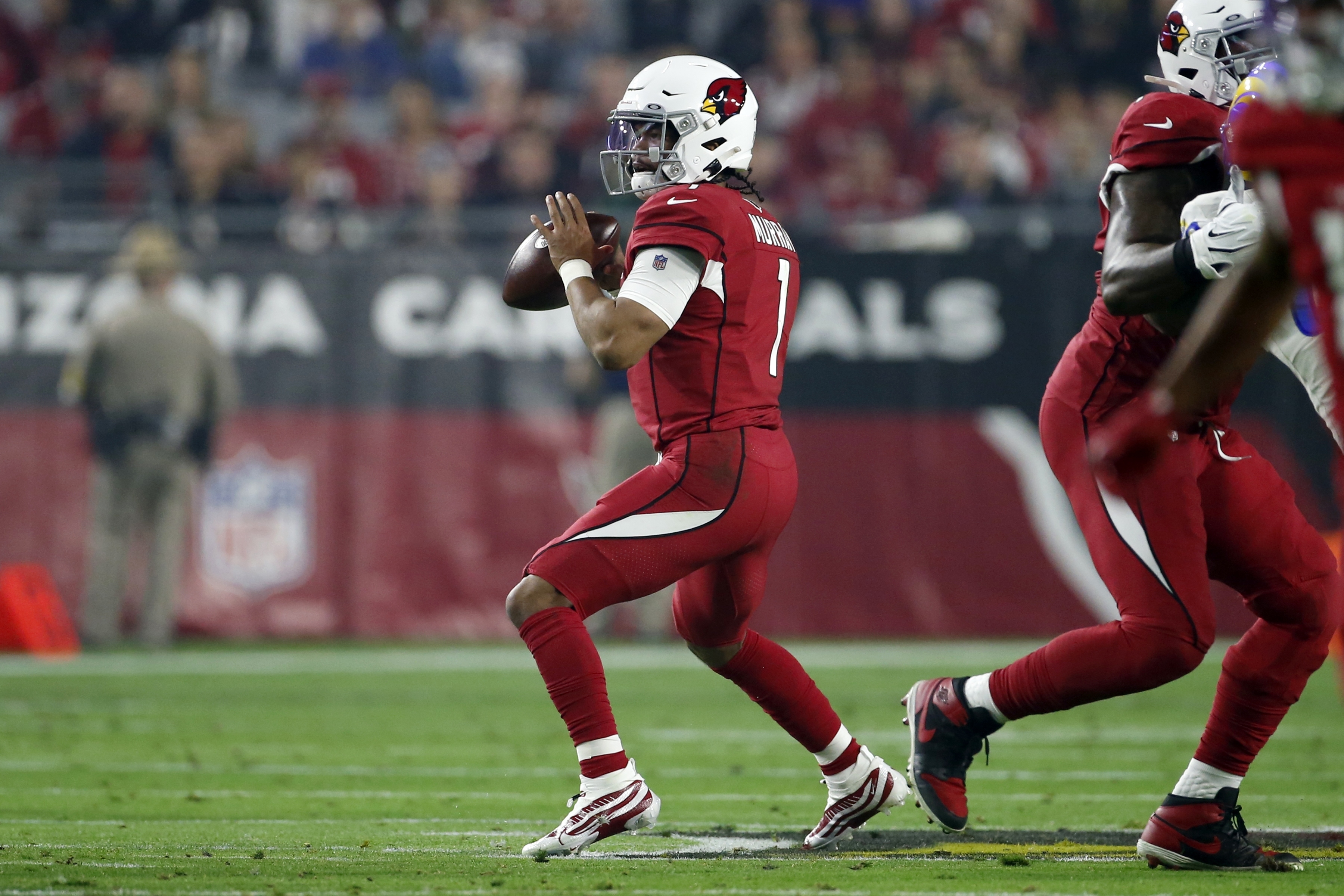 Stafford, Rams beat Cardinals through air in 30-23 victory