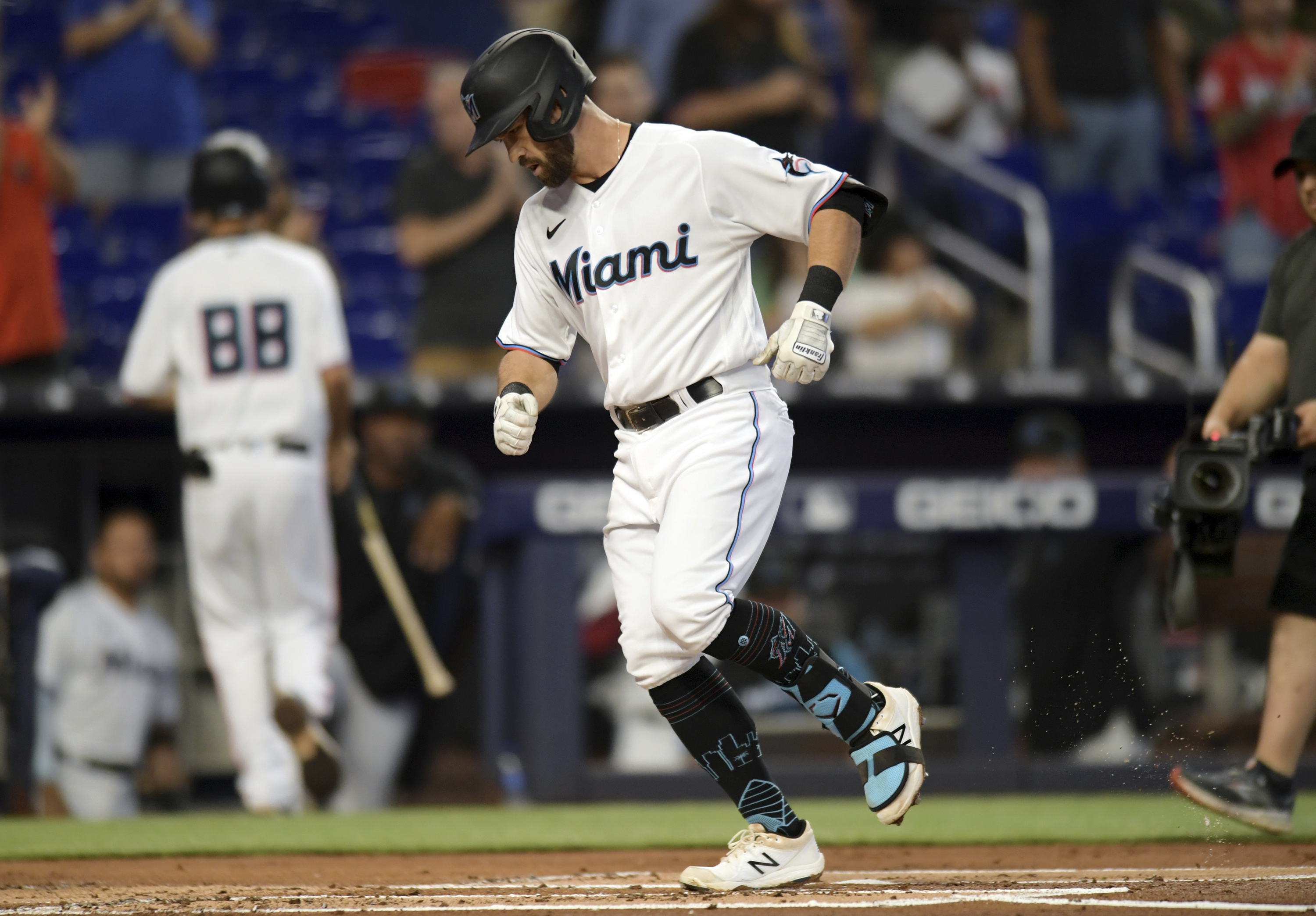 Homers from Burger and Chisholm in 8th lift Marlins to 11-5 win over Braves  - ABC News