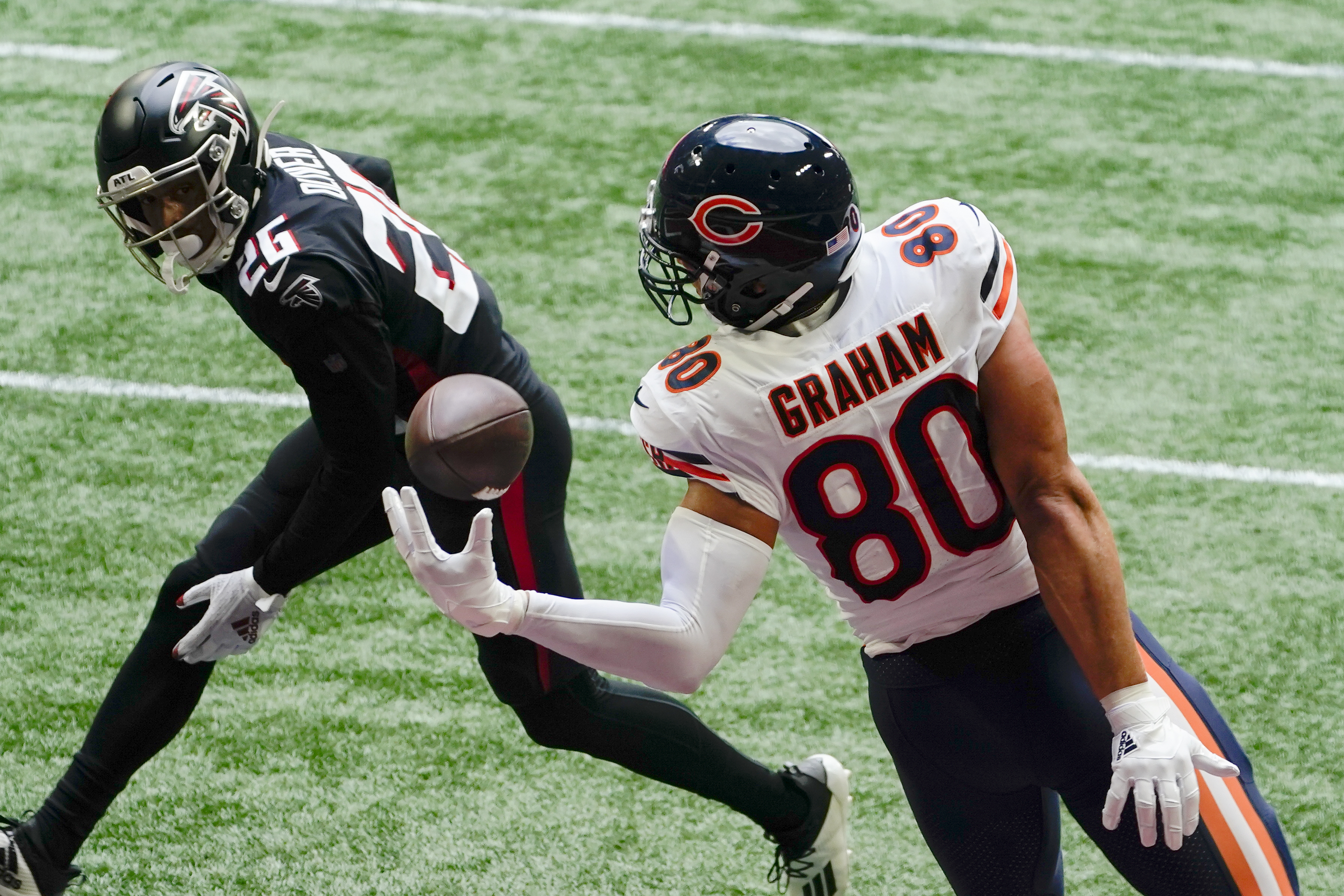 Atlanta Falcons running back Todd Gurley (21) works against the Chicago  Bears during the second half of an NFL football game, Sunday, Sept. 27,  2020, in Atlanta. The Chicago Bears won 30-26. (