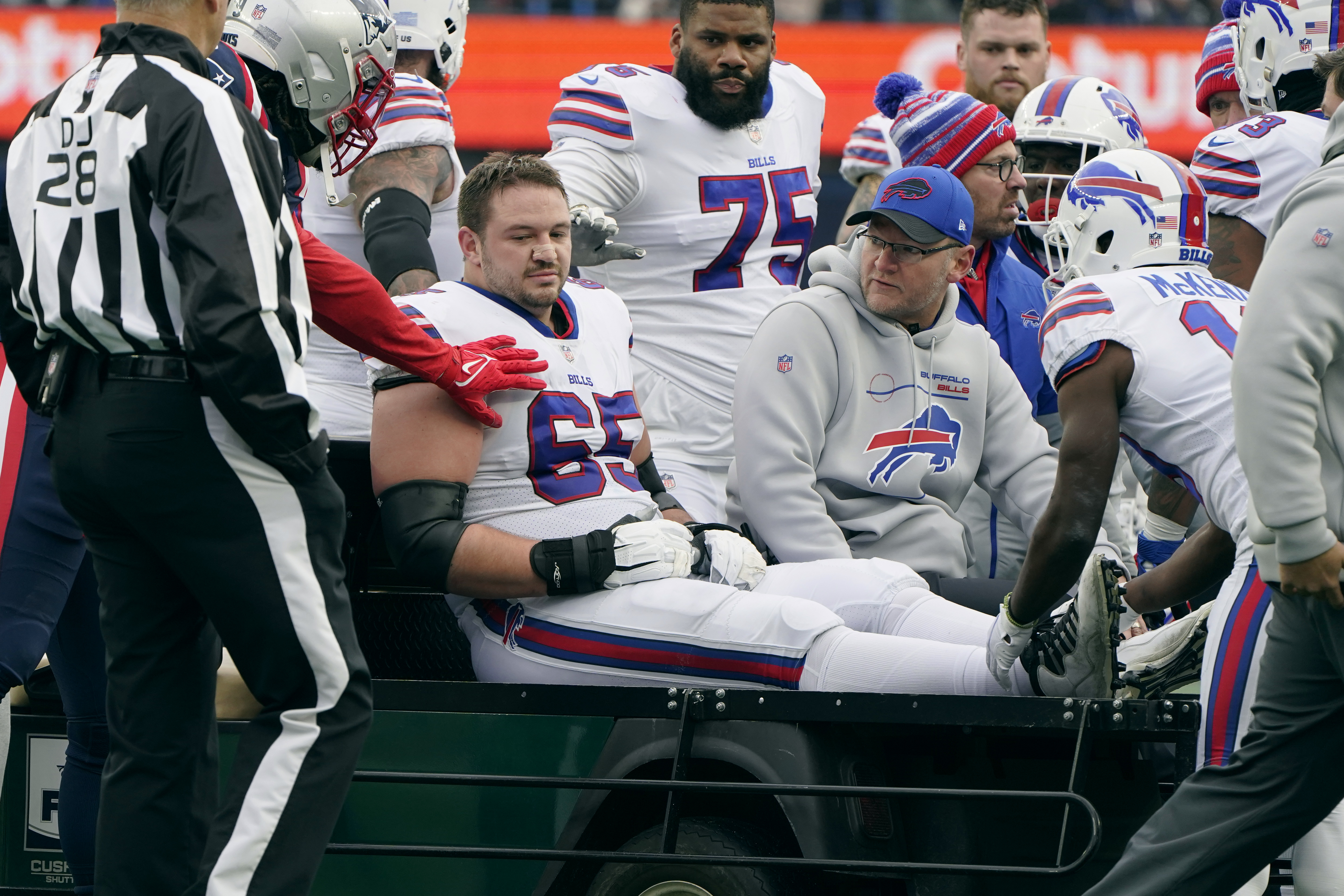 Buffalo Bills guard Ike Boettger (65) runs onto the field for an