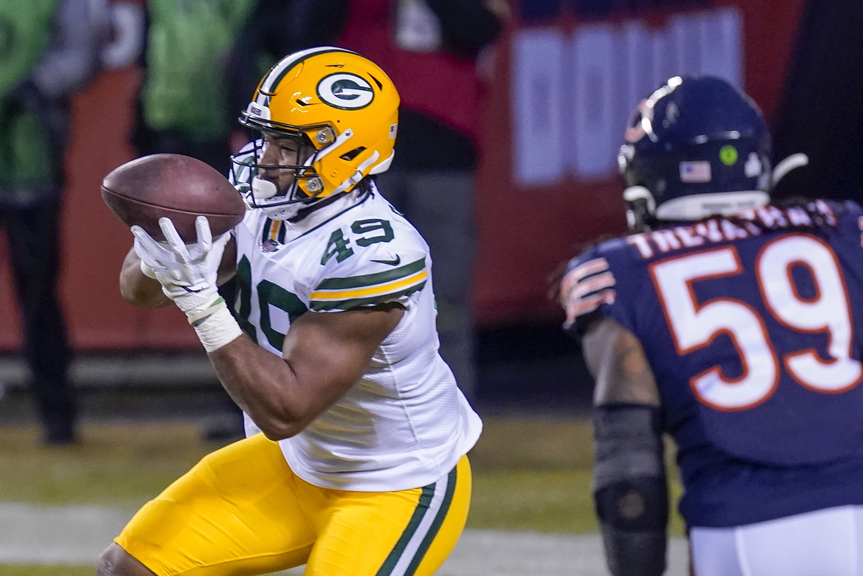 Rodgers throws 4 TDs, Packers beat Bears 35-16 for top seed