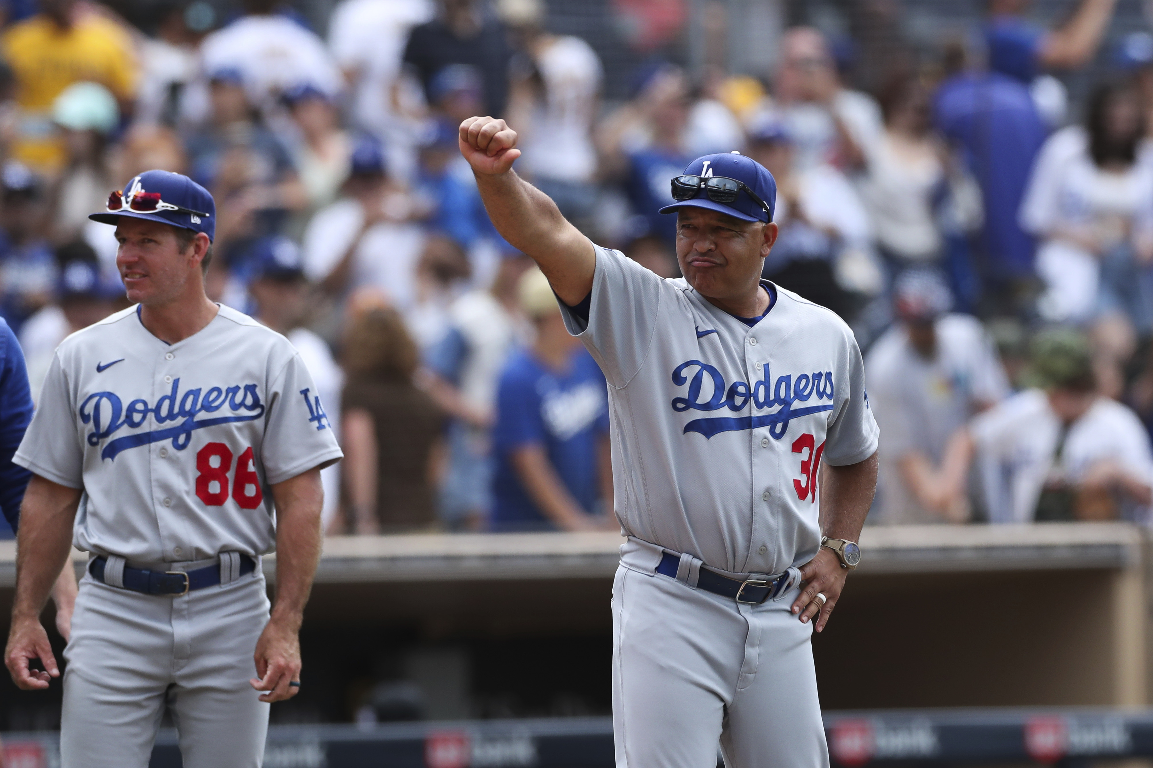 Los Angeles Dodgers pitcher Greg Maddux, left, celebrates with