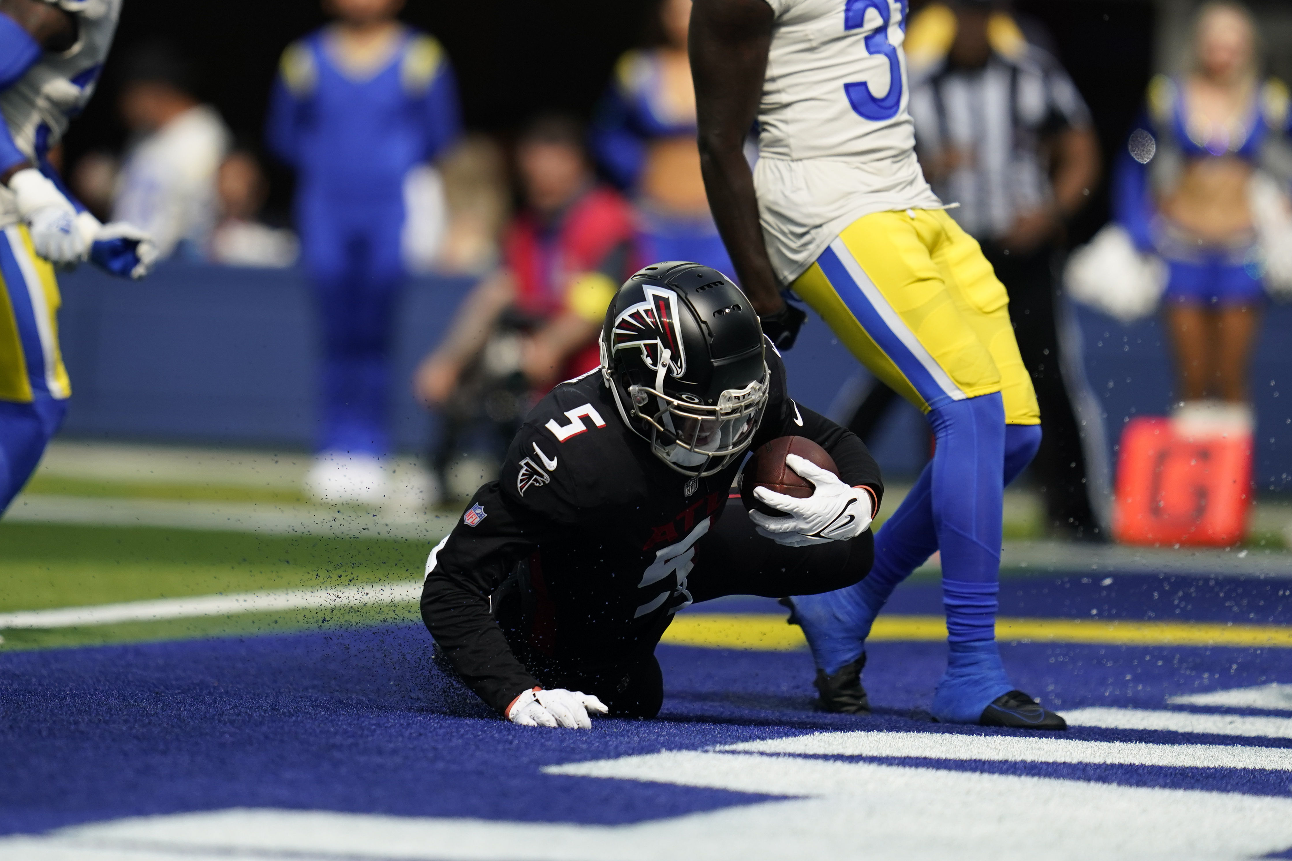 FILE - Atlanta Falcons running back Cordarrelle Patterson runs on his way  to scoring a touchdown during the first half of an NFL football game  against the Seattle Seahawks on Sept. 25