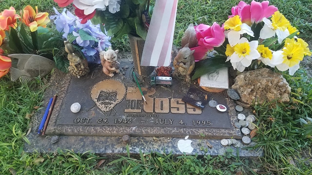 A baseball sits on the grave stone of famed Chicago Cubs