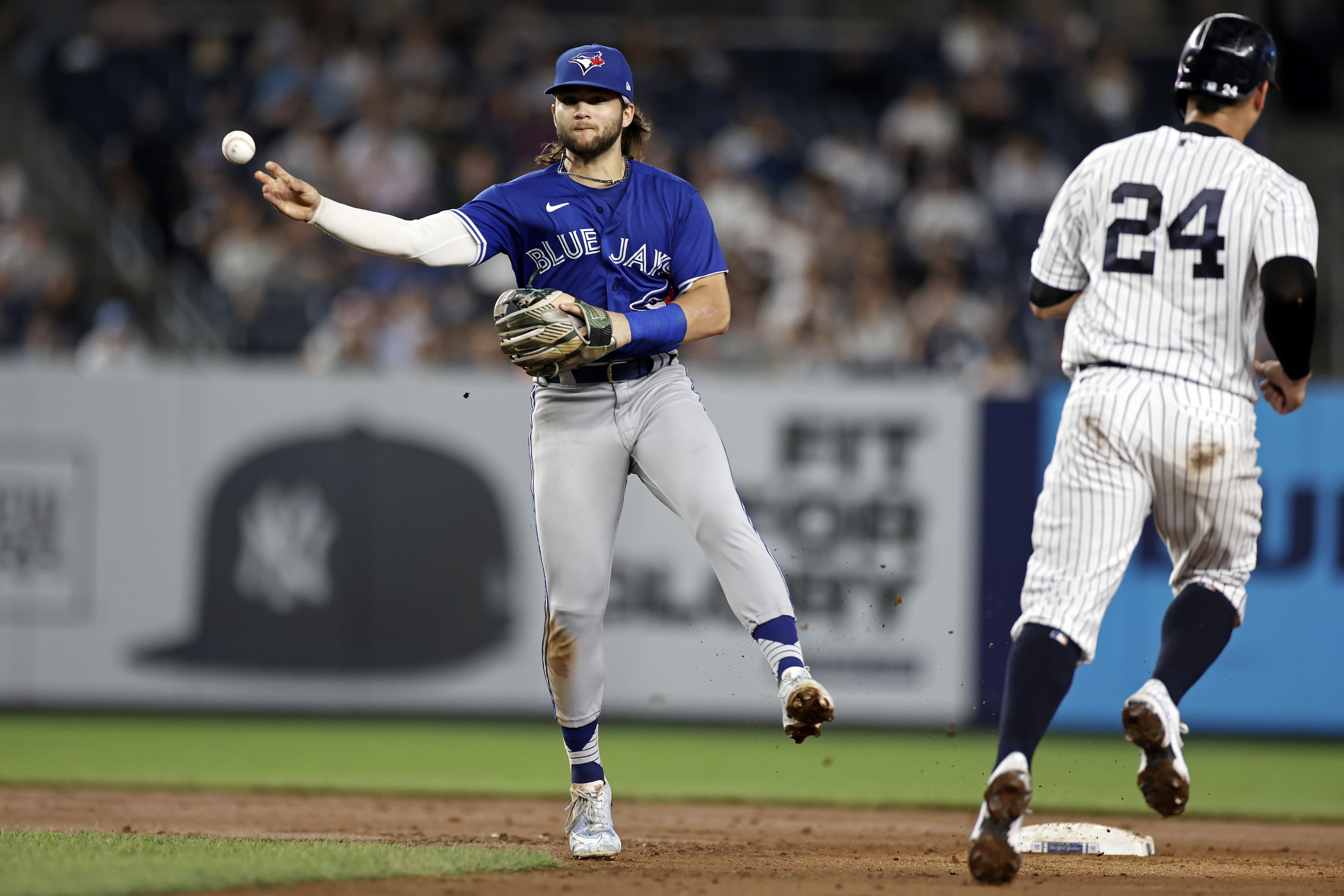 New York Yankees pitcher Sal Romano delivers a pitch to the Toronto Blue  Jays during the seventh inning of a baseball game on Thursday, Sept. 9,  2021, in New York. (AP Photo/Adam