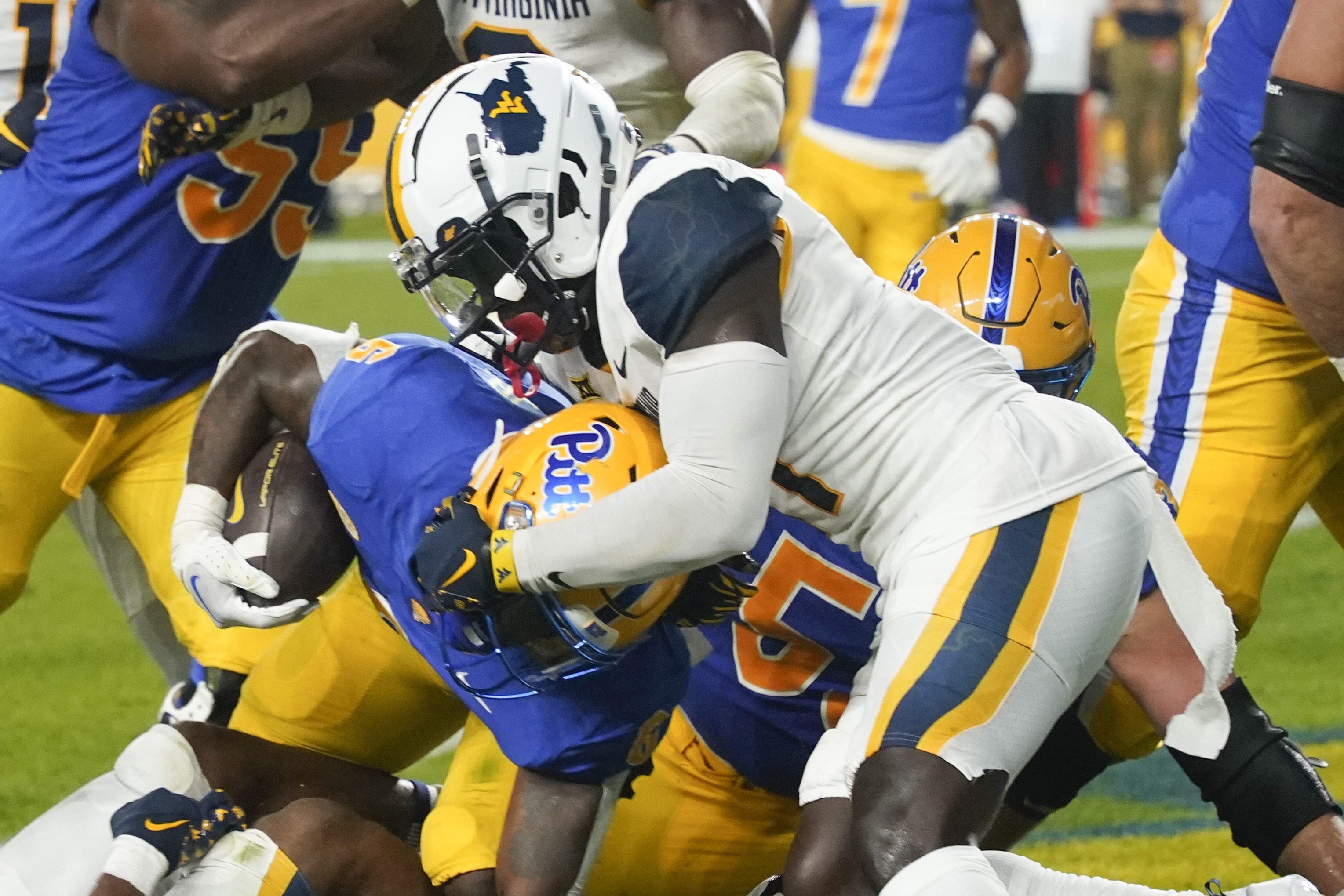 Devonshire's late Pick 6 lifts No. 17 Pitt over WVU, 38-31