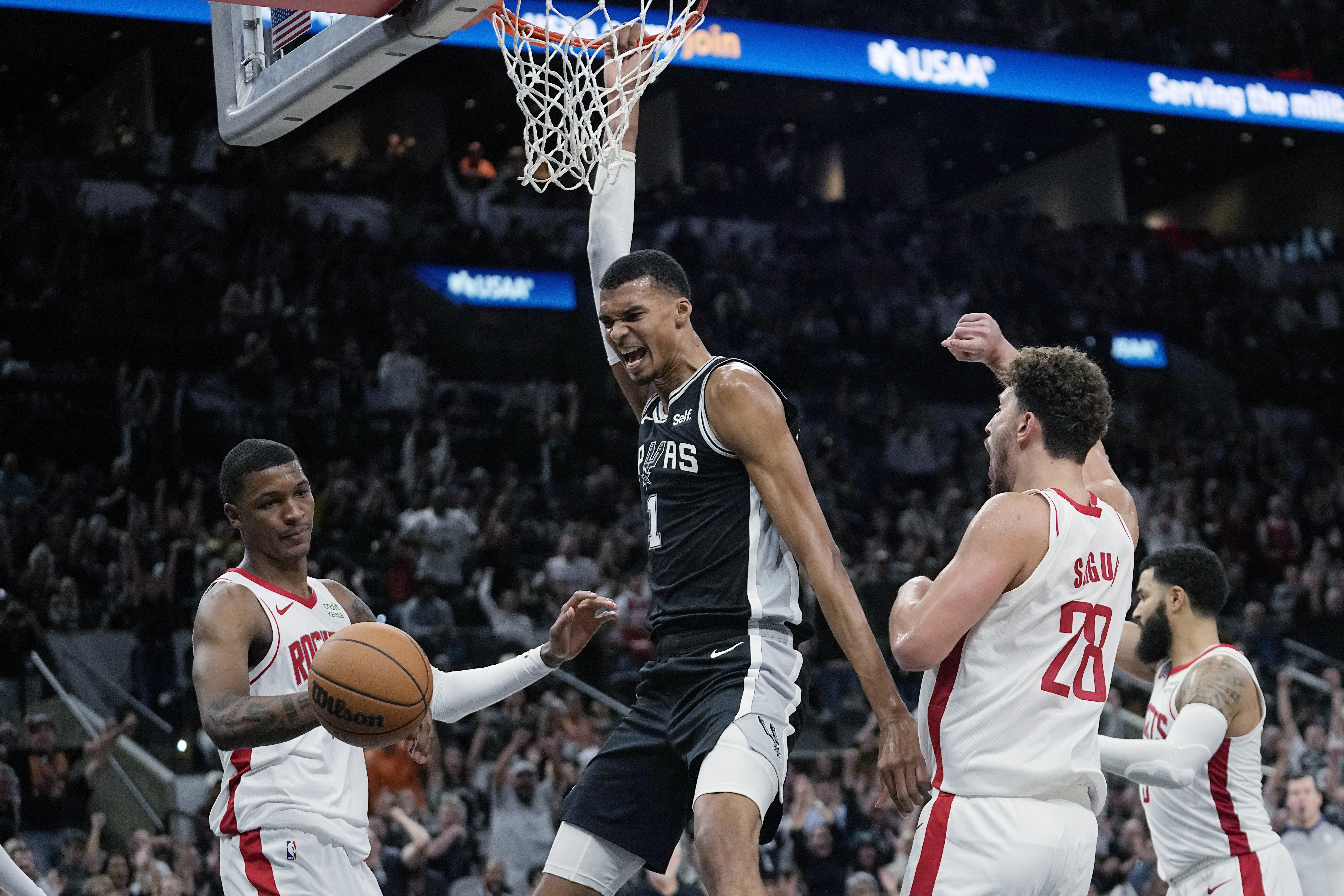 Wembanyama makes tying basket in regulation, then earns his first NBA win  as Spurs top Rockets in OT