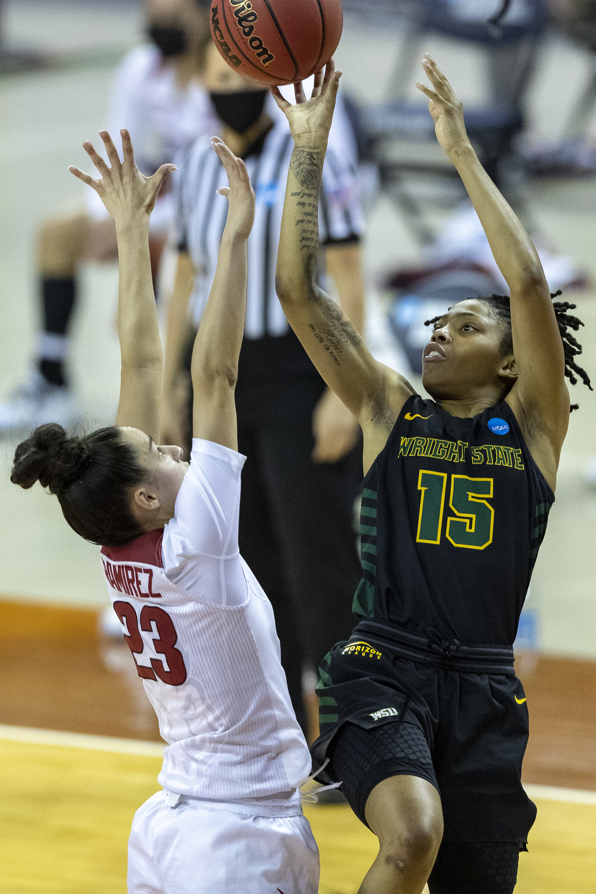 Baker and No. 13 Wright State down No. 4 Arkansas 66-62