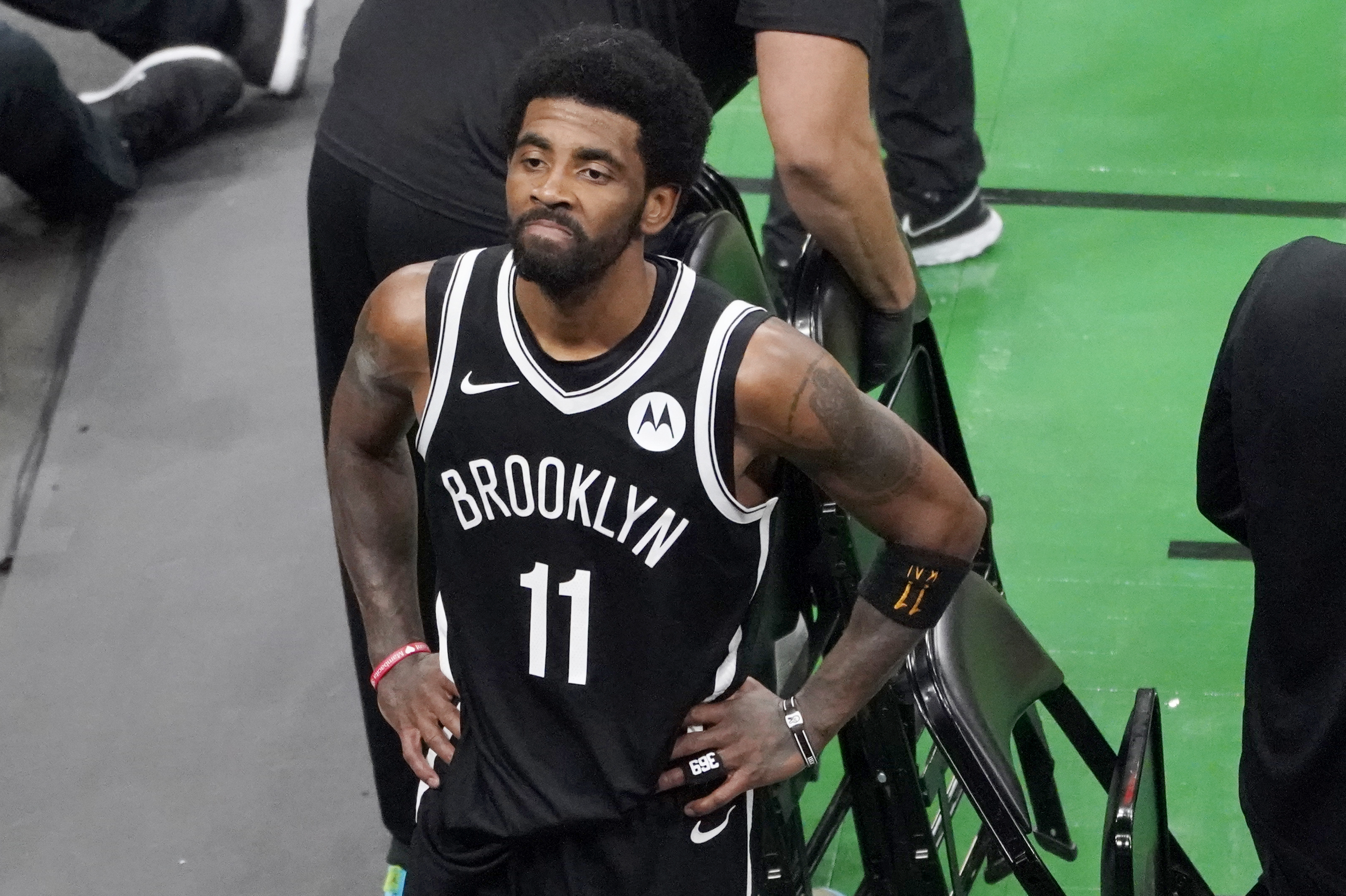 Fan at TD Garden detained, cuffed for throwing water bottle at Kyrie Irving  after Game 4