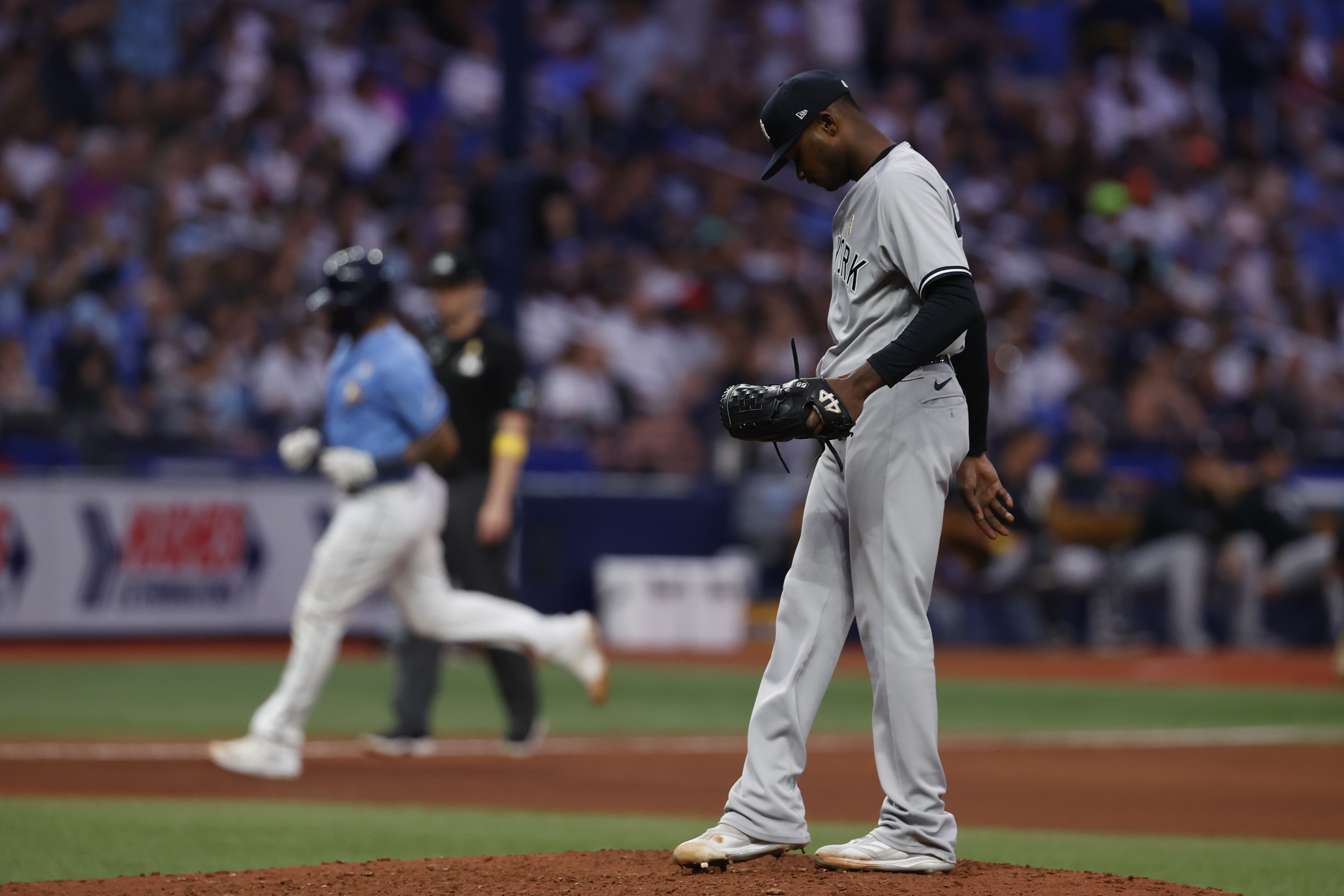 Hill strikes out 9, Rays beat COVID-19 impacted Yankees 9-1