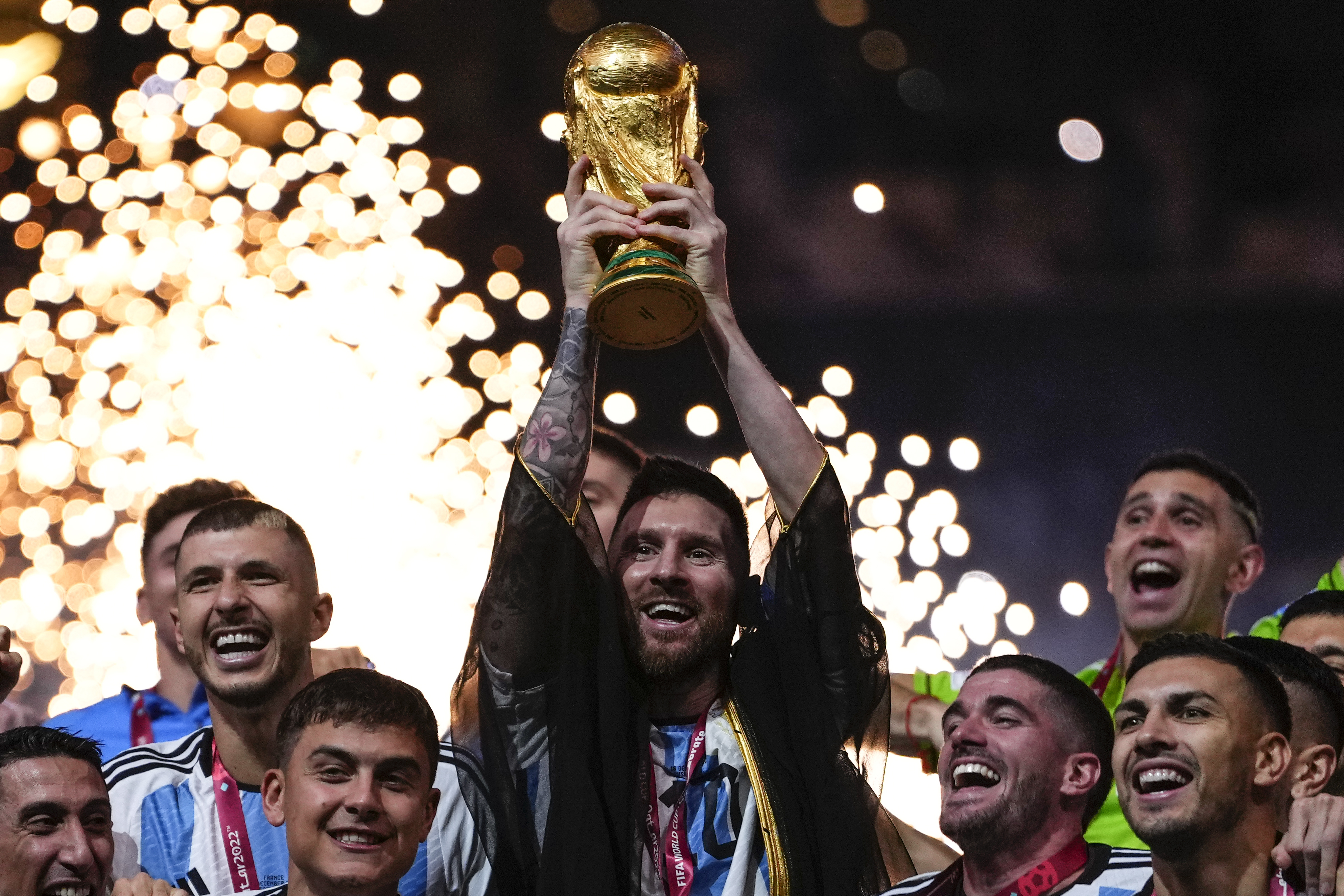 Lionel Messi: Argentina captain wears traditional Arab cloak to lift World  Cup trophy after final win over France, Football News