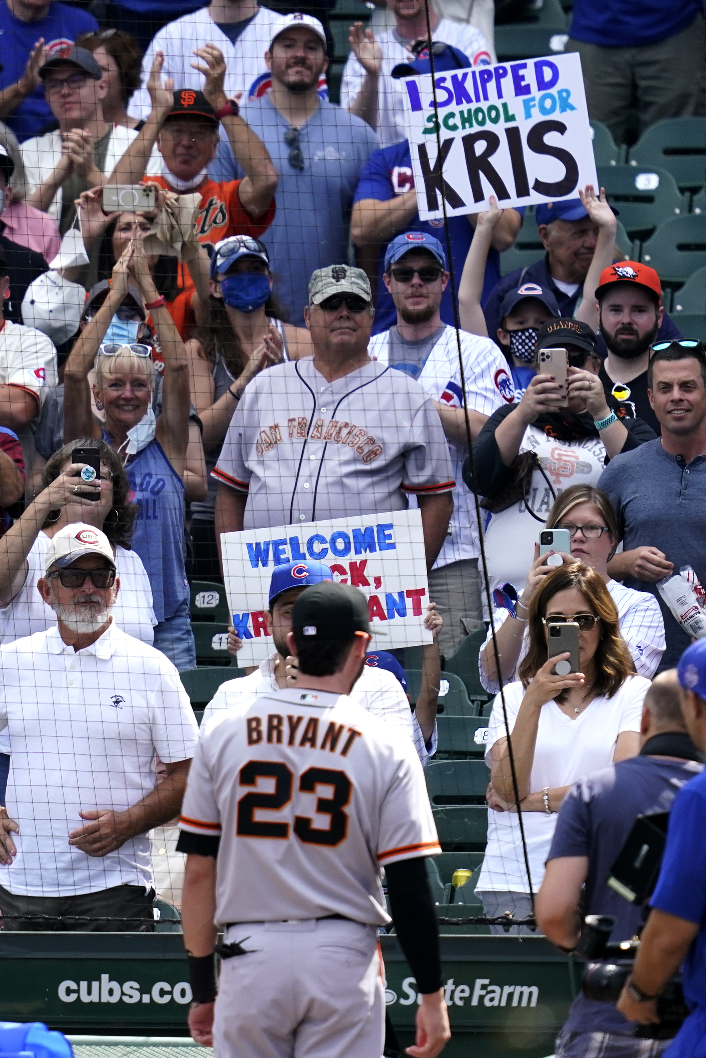 LOOK: Cubs fans pay tribute to Kris Bryant by wearing his jersey at game