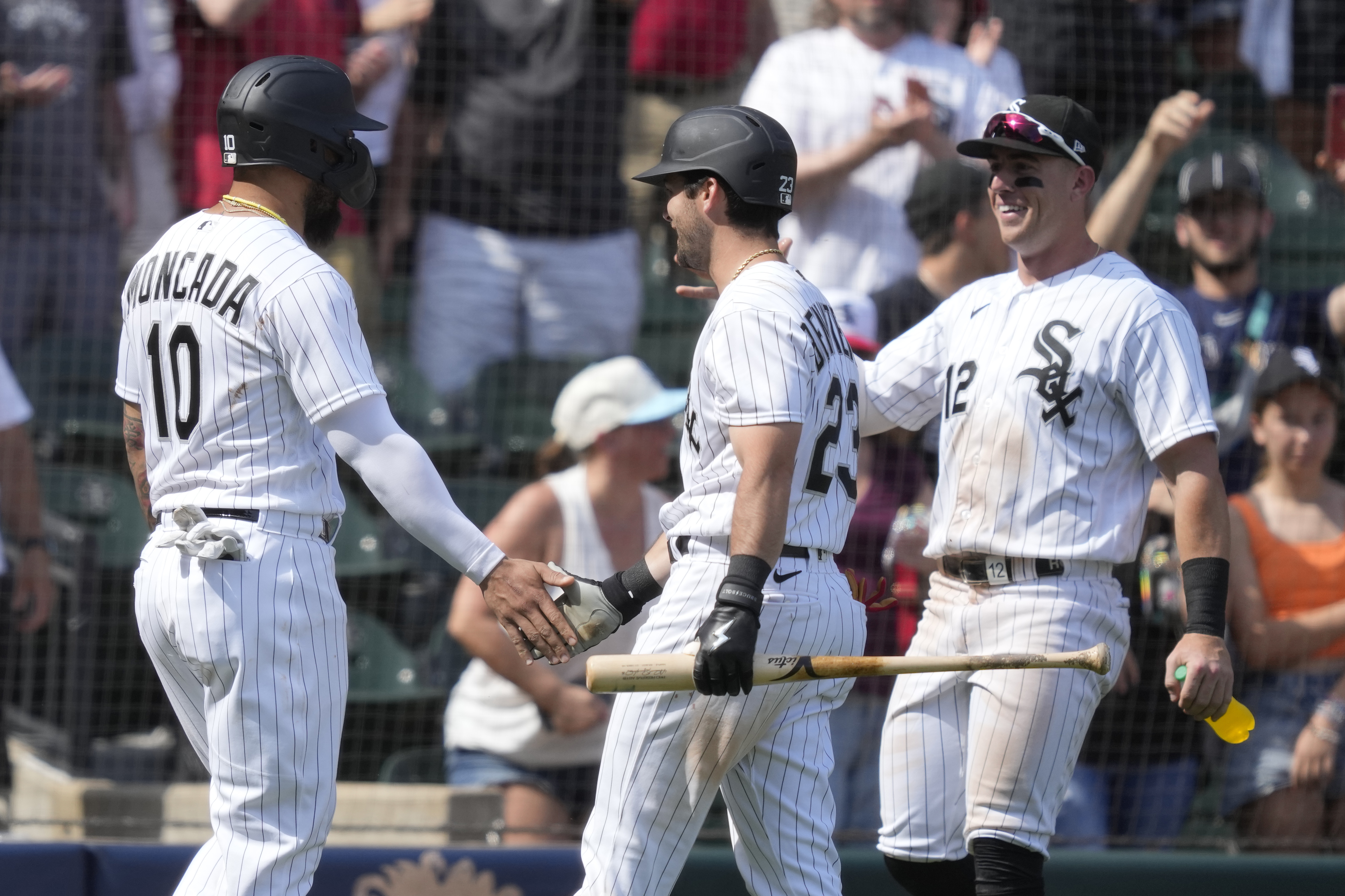 CHICAGO, IL - APRIL 06: Chicago White Sox left fielder Andrew Benintendi  (23) heads to the dugout in between innings during an MLB game against the  San Francisco Giants on April 06