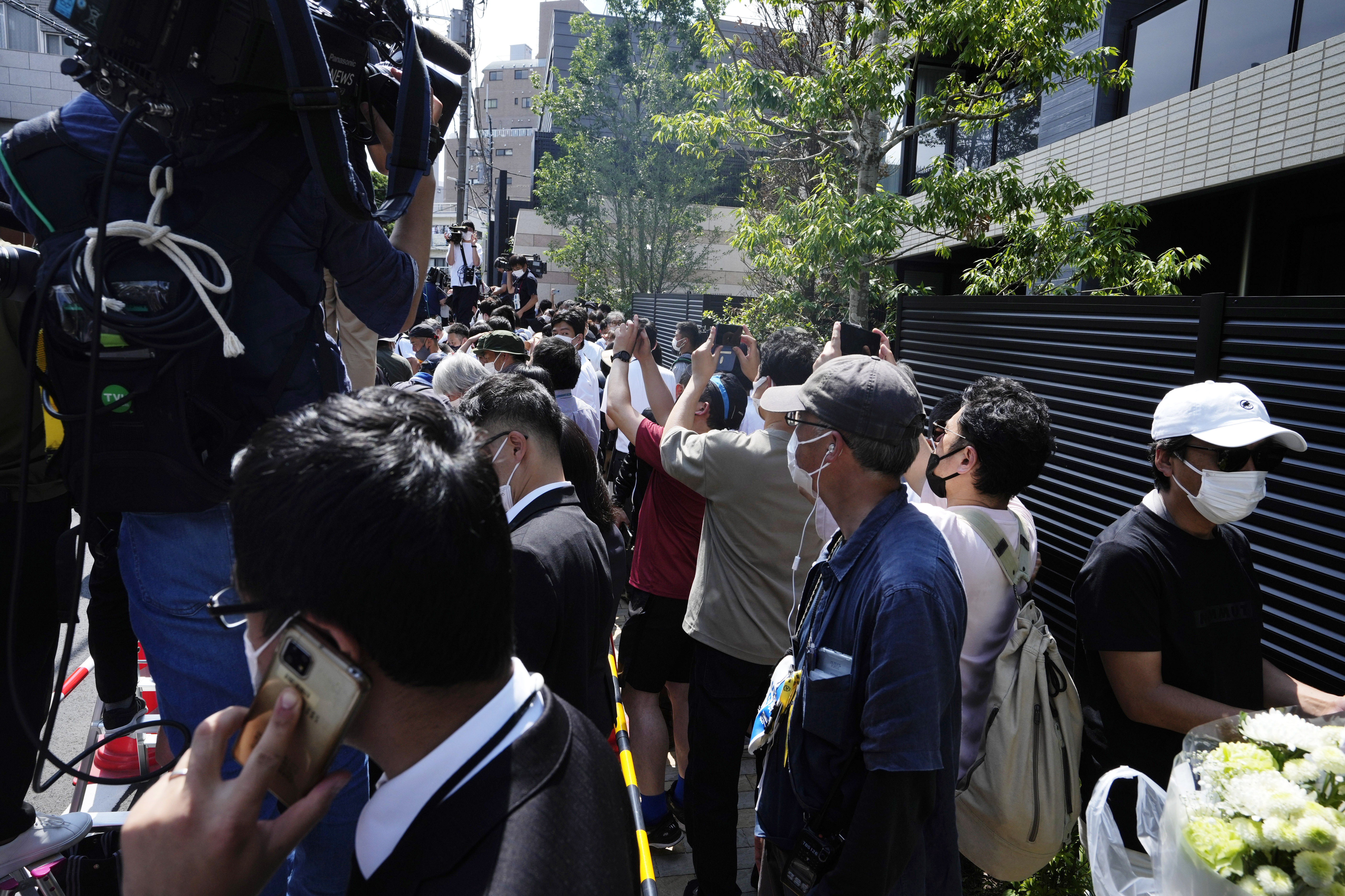 Abe's body arrives in Tokyo as country mourns ex-PM's death