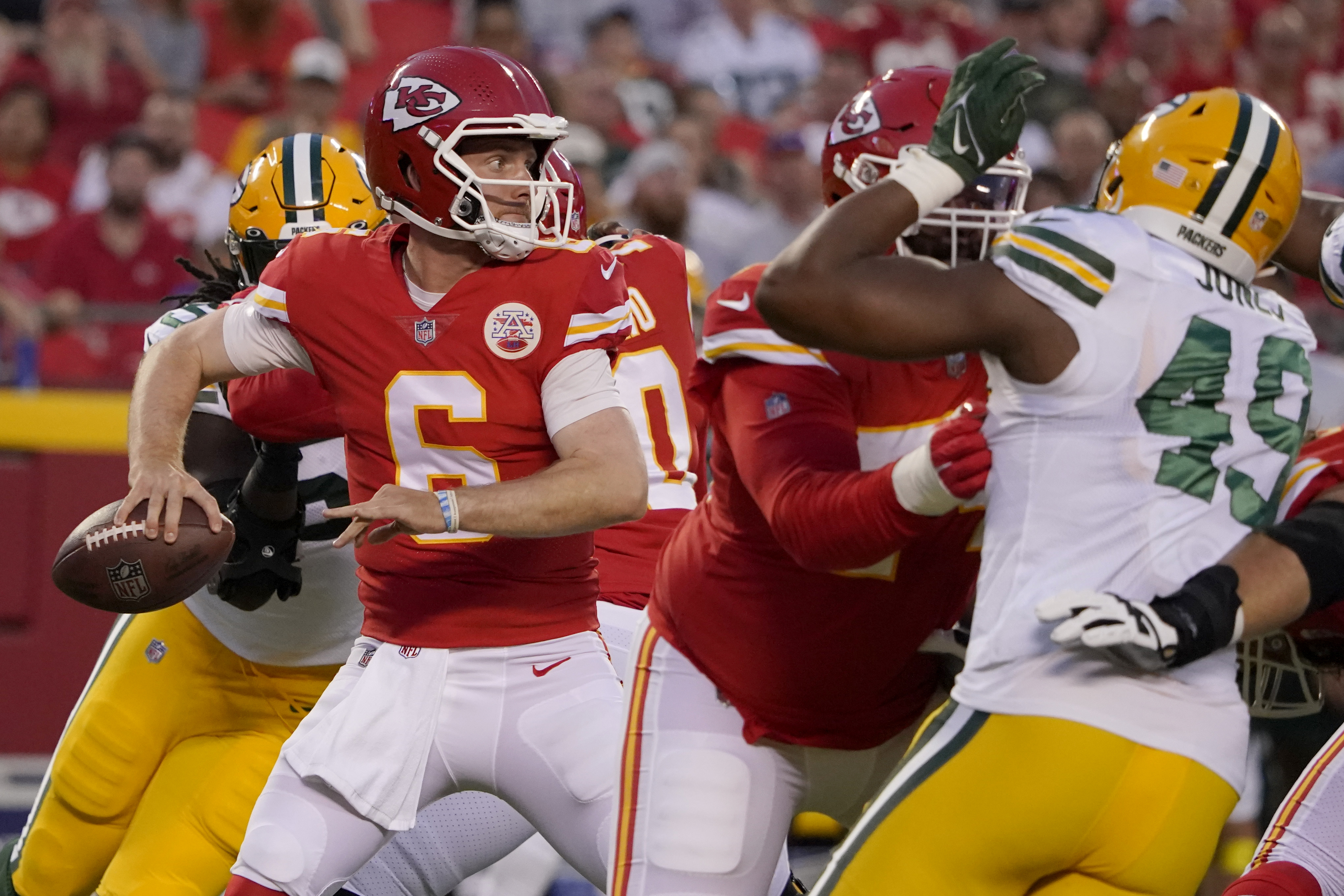 Kansas City Chiefs tight end Matt Bushman (89) scores on a touchdown run as  Green Bay Packers cornerback Rico Gafford (37) gives chase during the first  half of an NFL preseason football