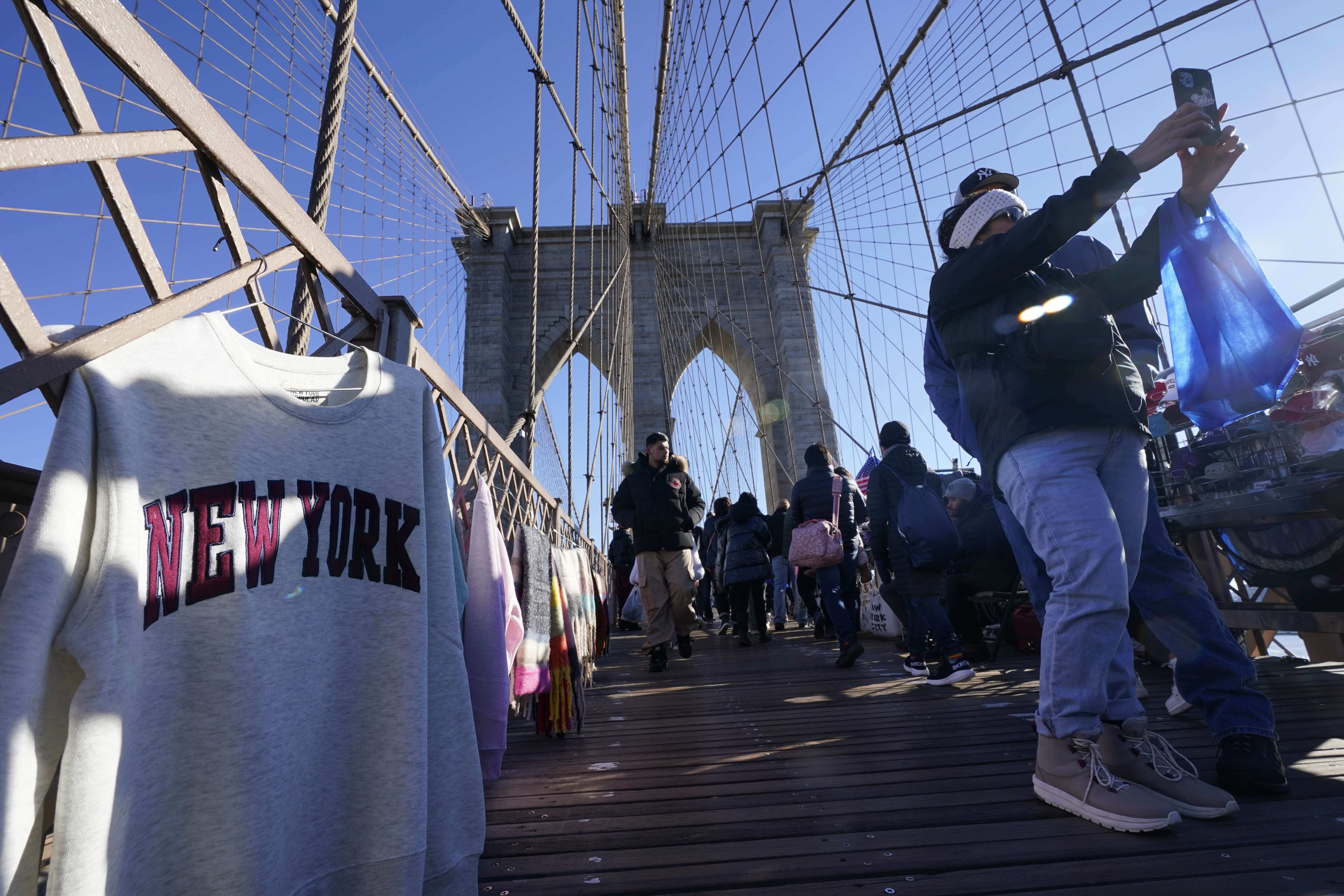 New York City evicts vendors from Brooklyn Bridge, ending a bustling  tourist market to ease crowding