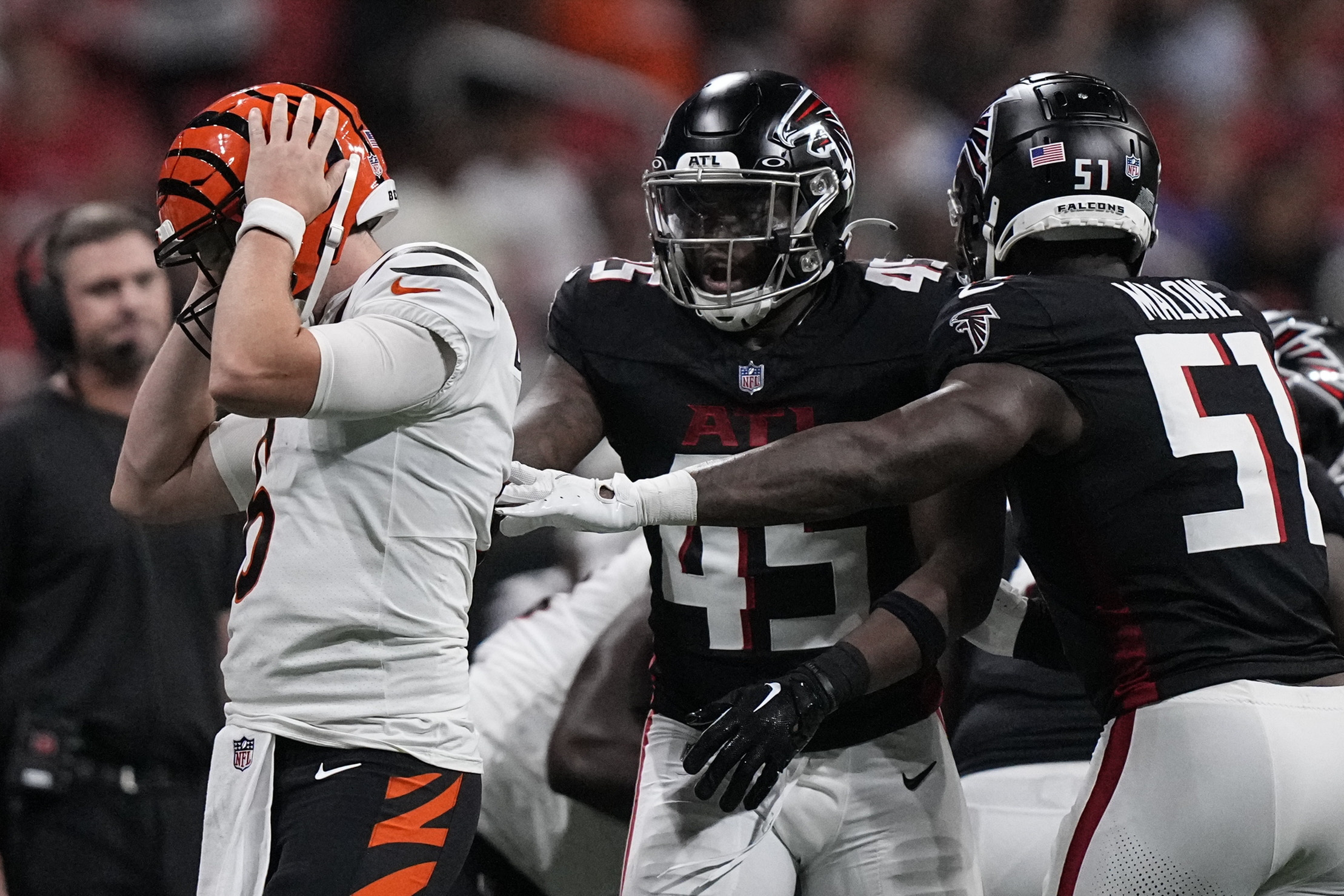 KhaDarel Hodge of the Atlanta Falcons celebrates with Parker