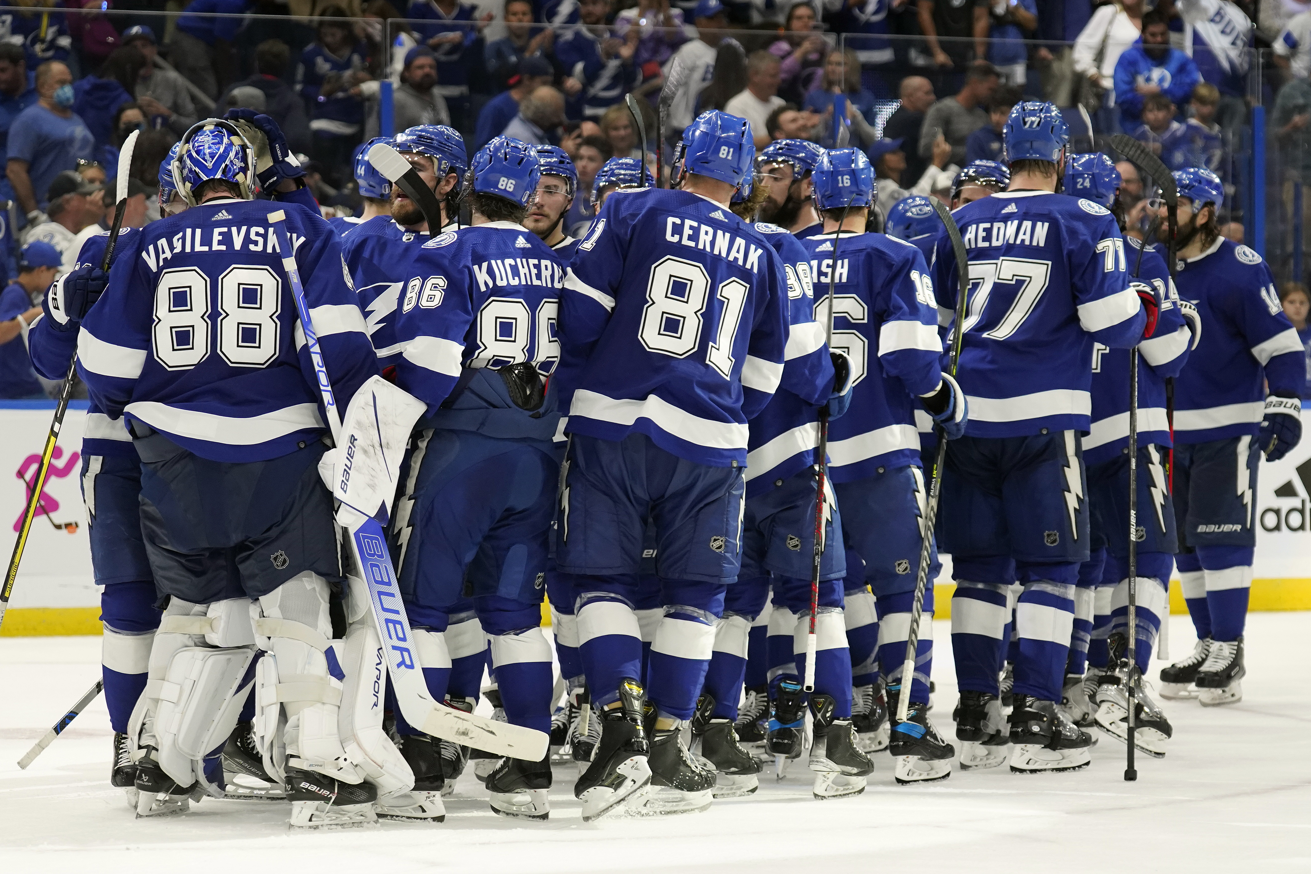 Tampa Bay Lightning's Nikita Kucherov (86) and goalie Andrei