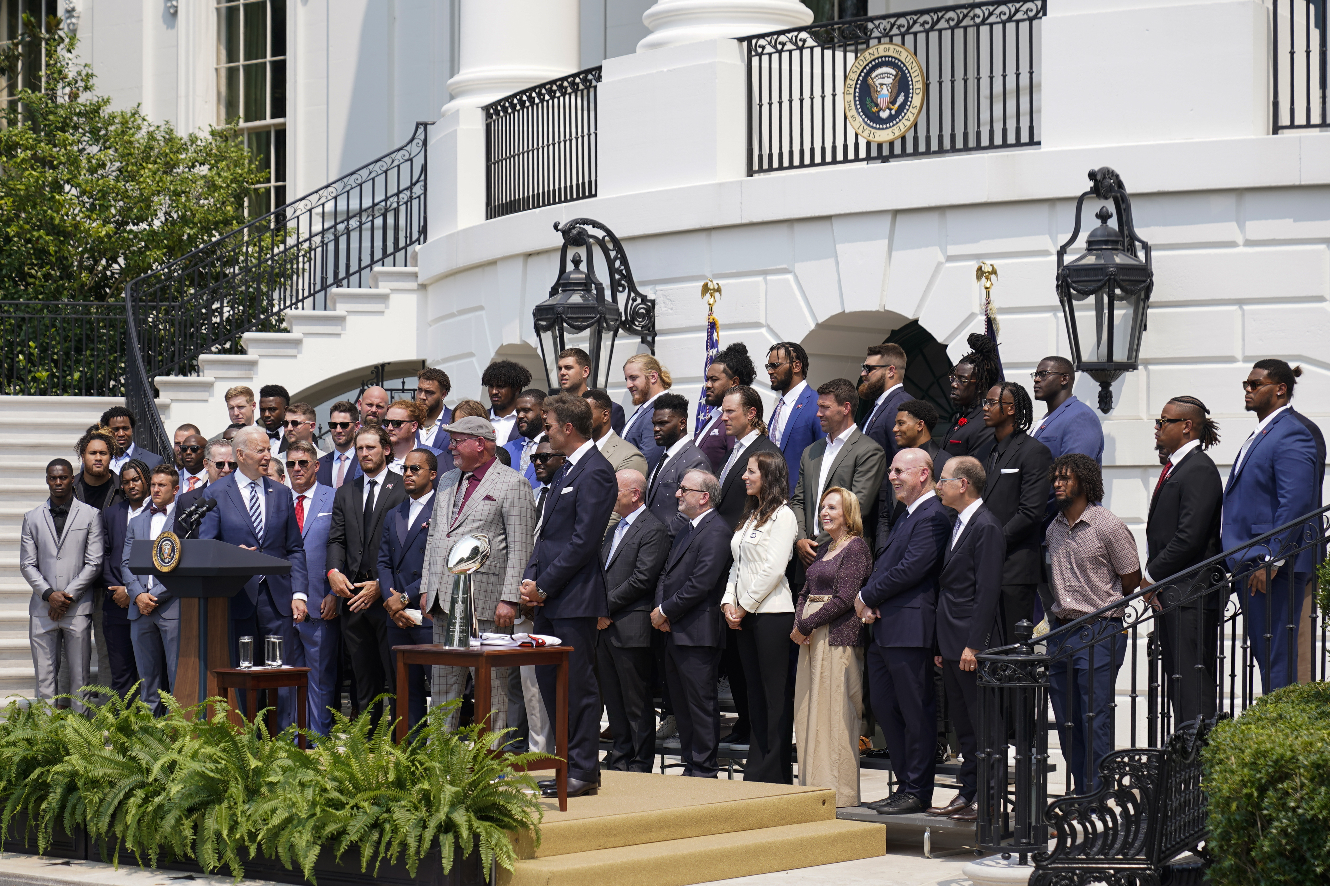 Washington, United States. 20th July, 2021. U.S. President Joe Biden, holds  a number 46 jersey handed to him by Super Bowl Champions Tampa Bay  Buccaneers owner Bryan Glazer, on the South Lawn