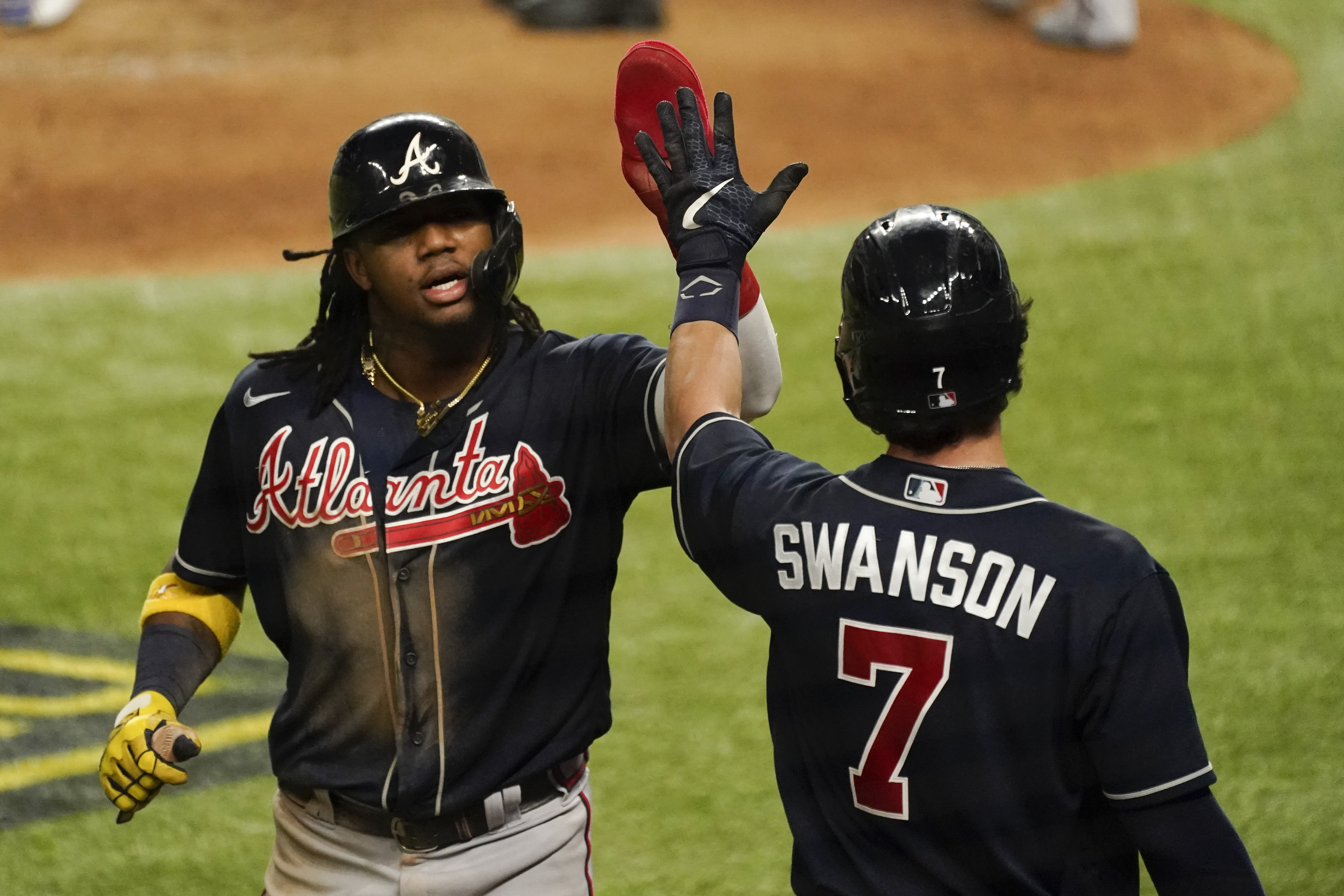 Braves maintain perfect postseason record, hang on late against Dodgers to  take 2-0 lead in NLCS 